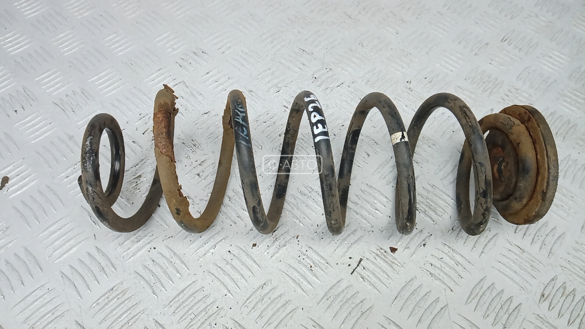 Пружина задняя