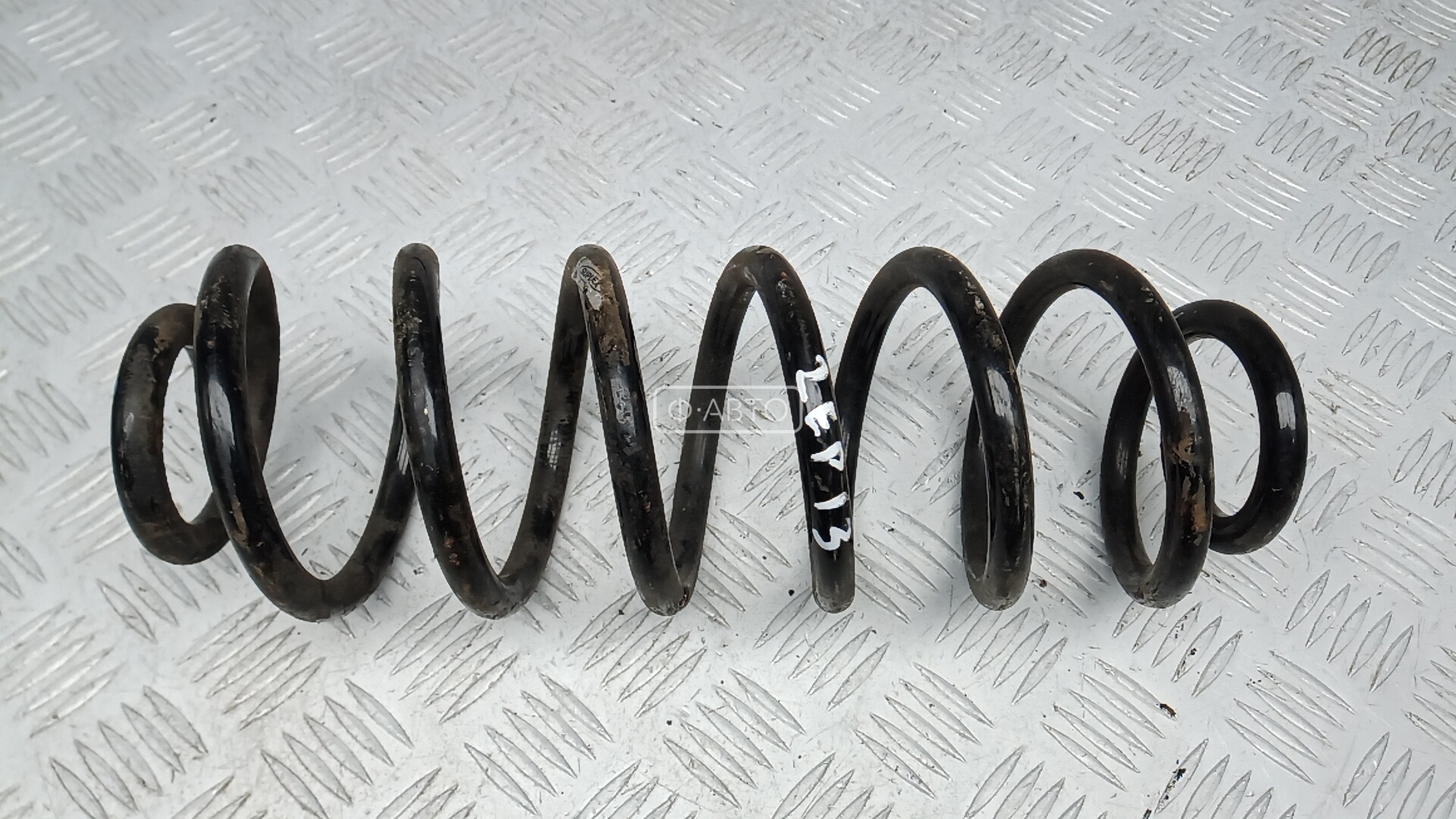 Пружина задняя