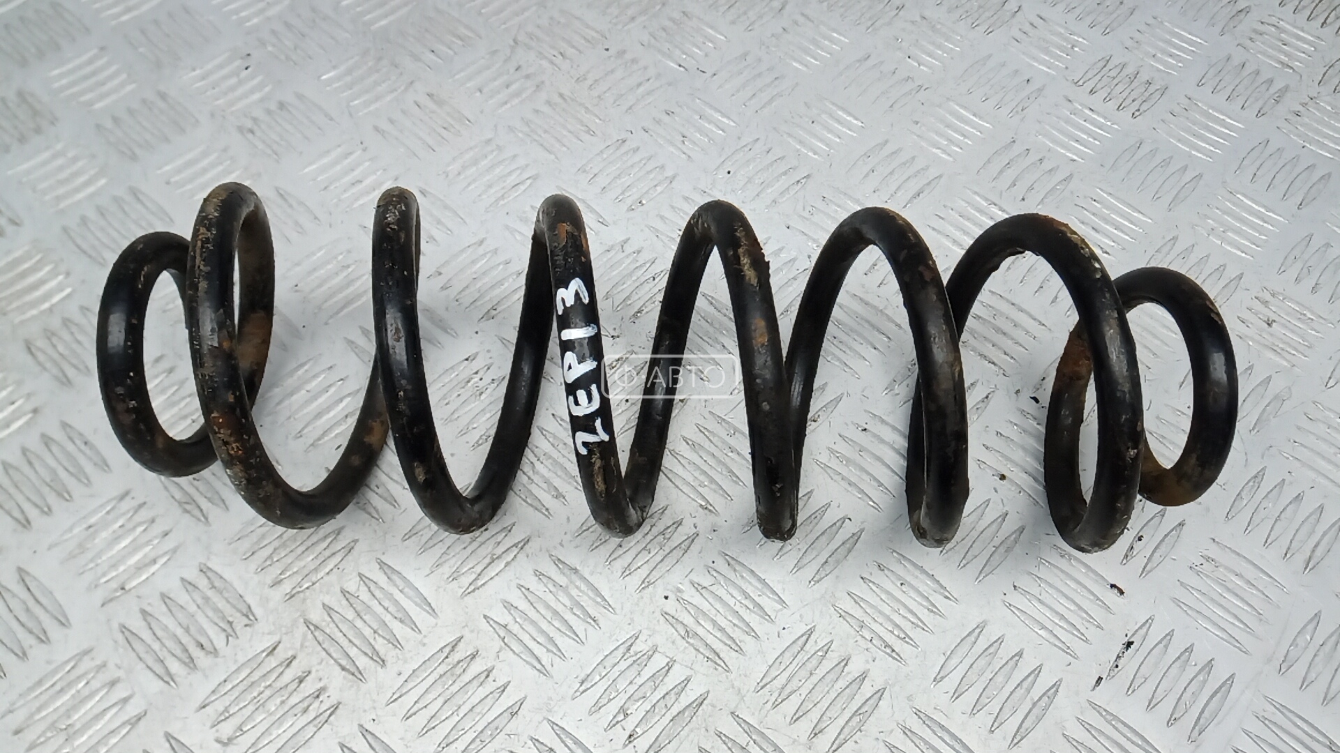 Пружина задняя