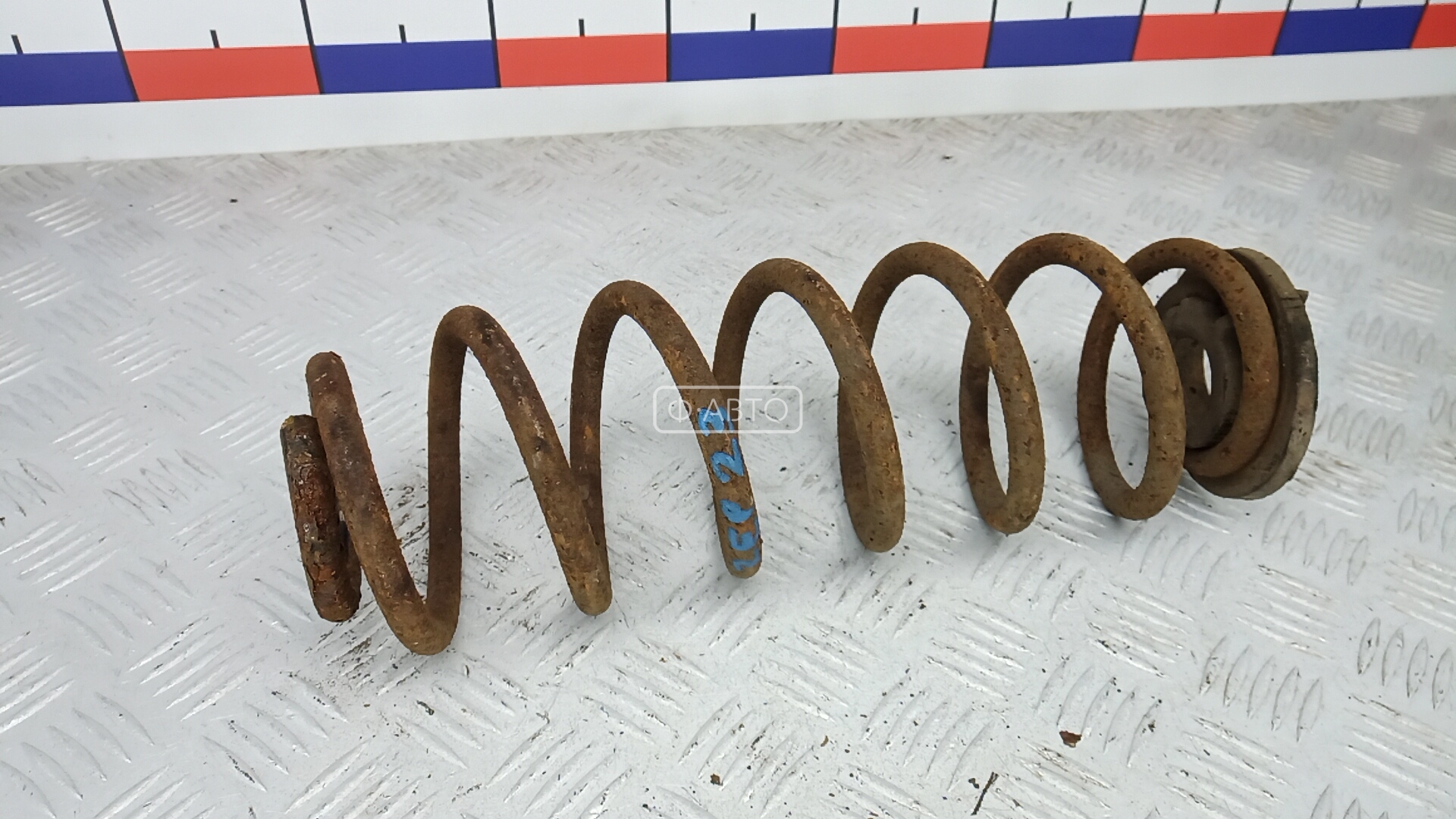 Пружина задняя