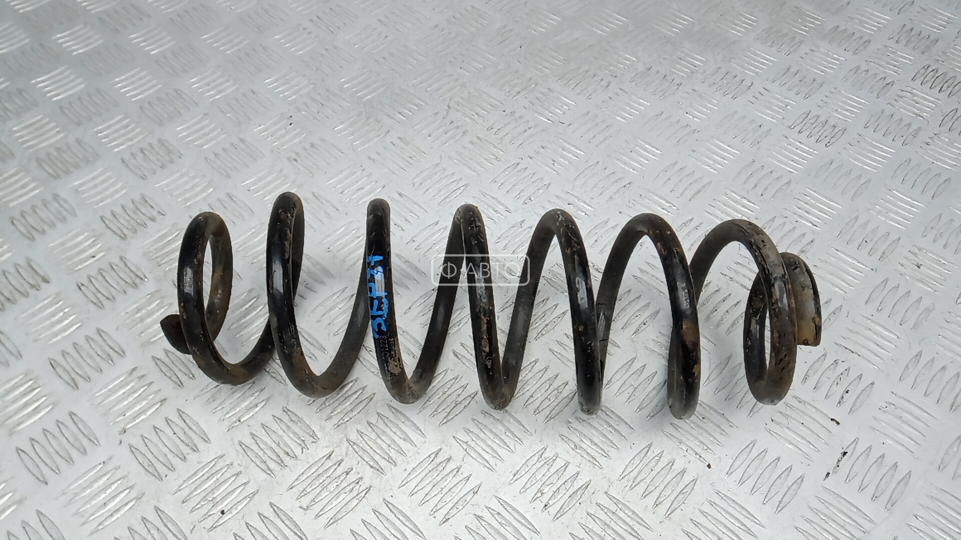 Пружина задняя