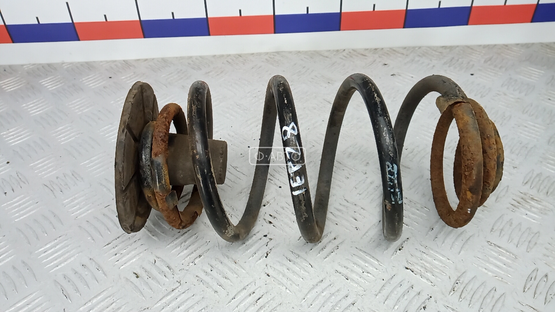 Пружина задняя