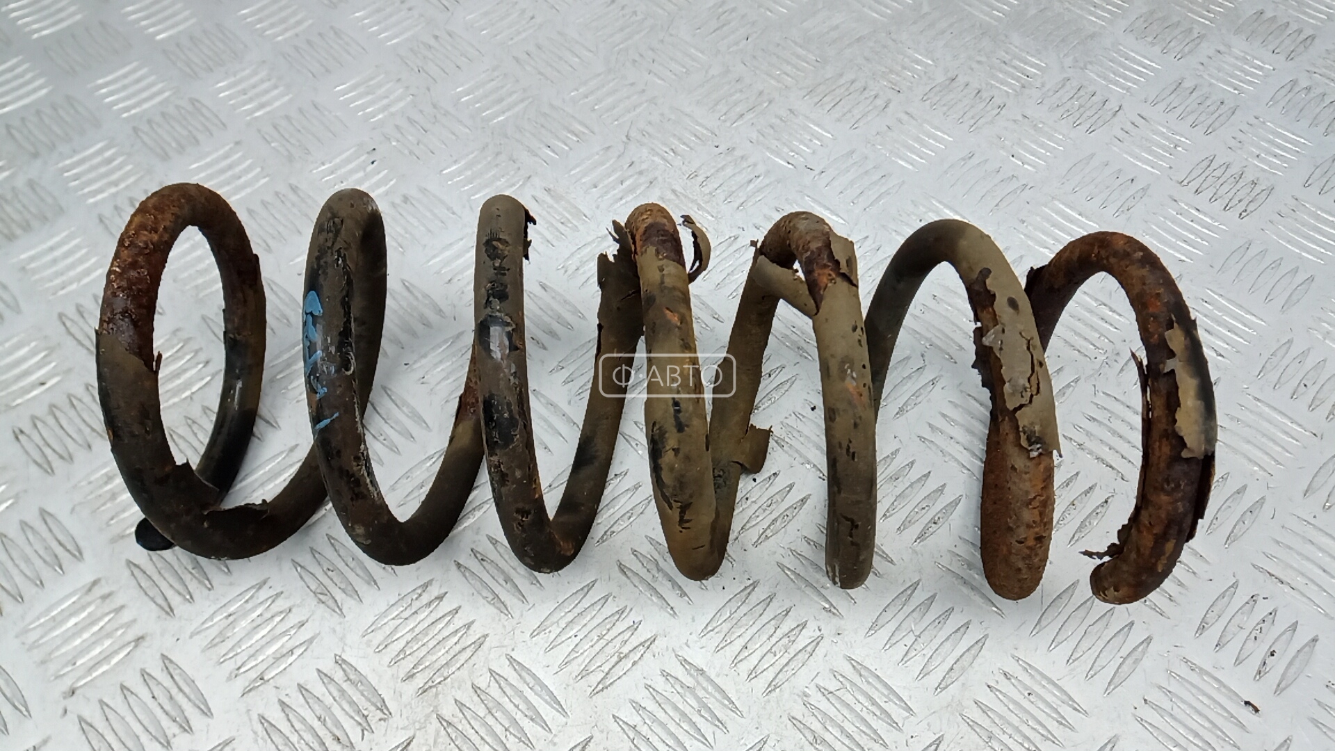 Пружина задняя