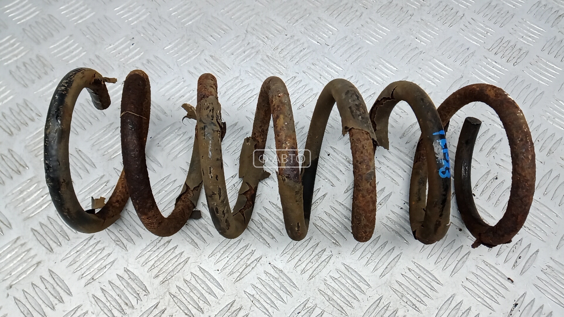 Пружина задняя