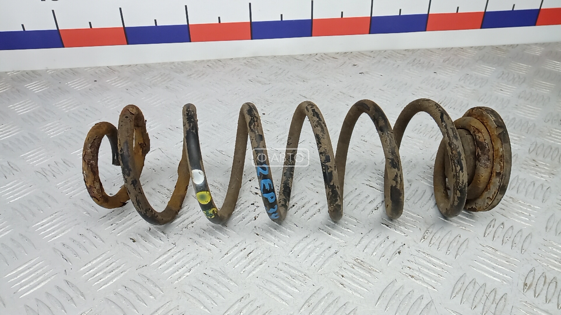 Пружина задняя