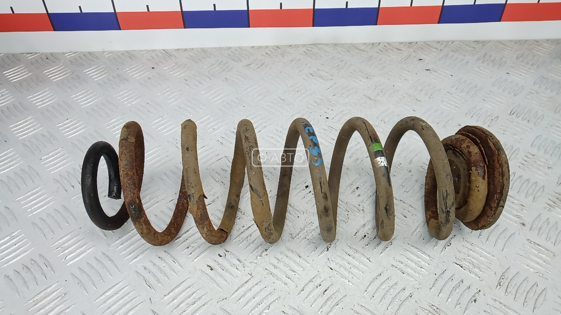 Пружина задняя