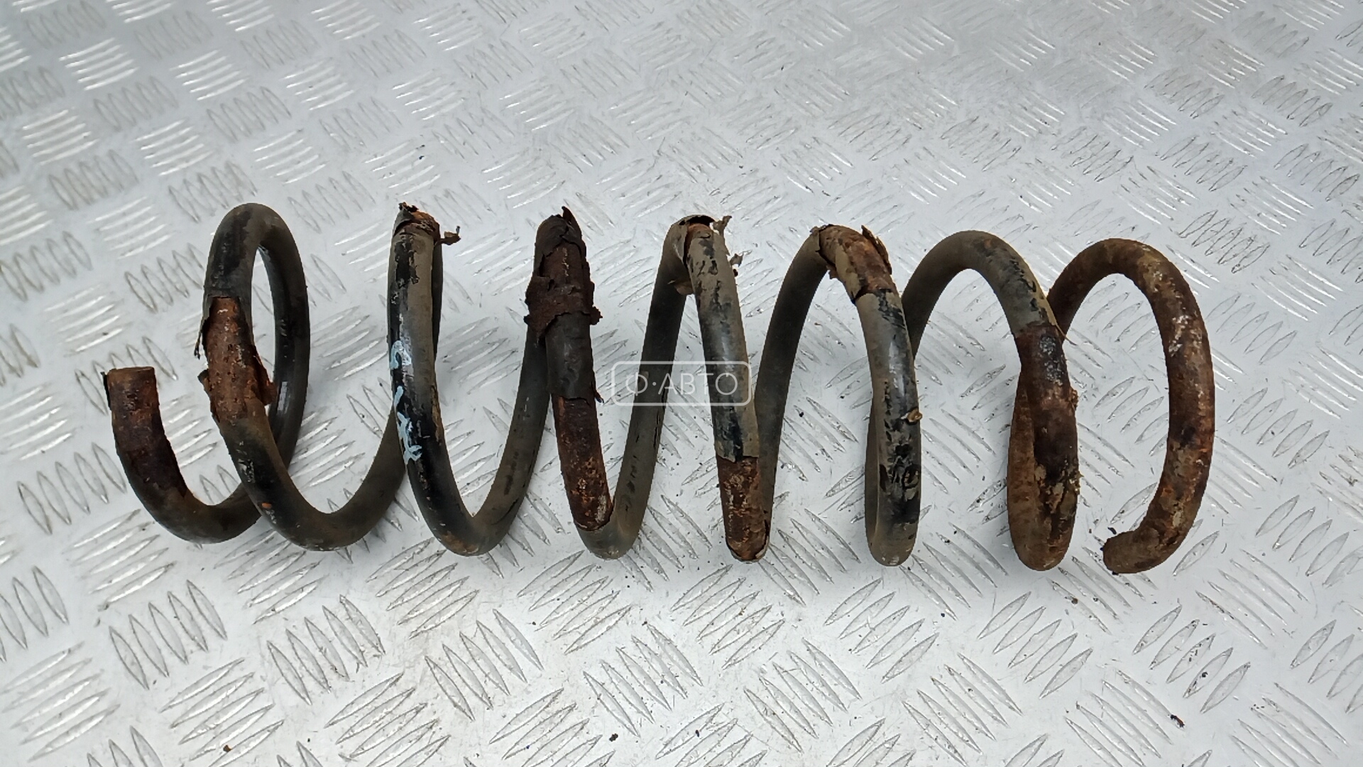 Пружина задняя