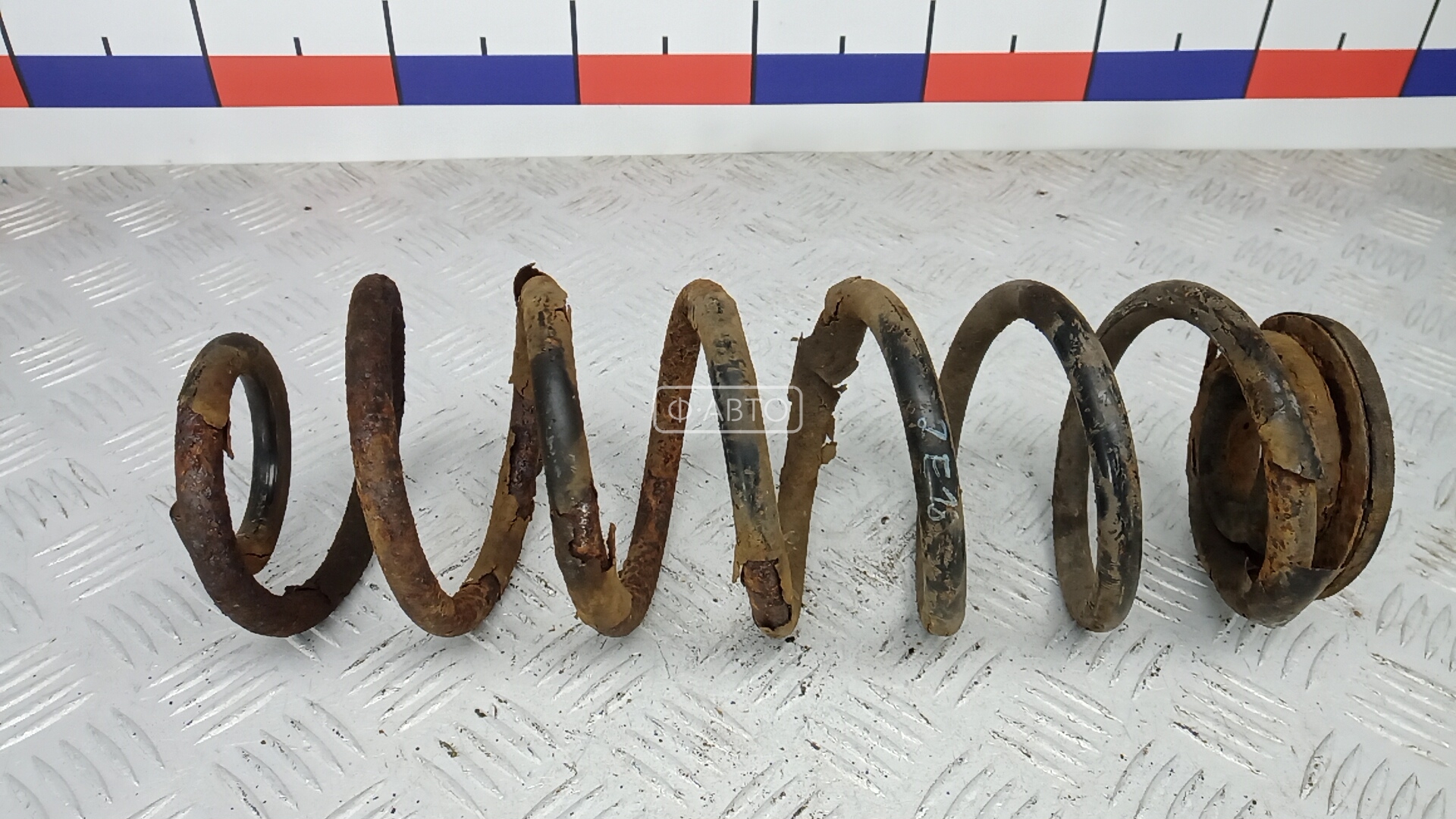 Пружина задняя