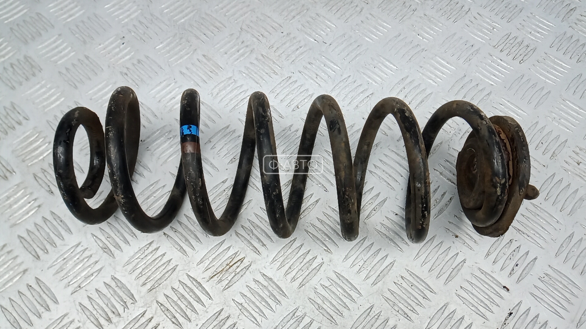 Пружина задняя