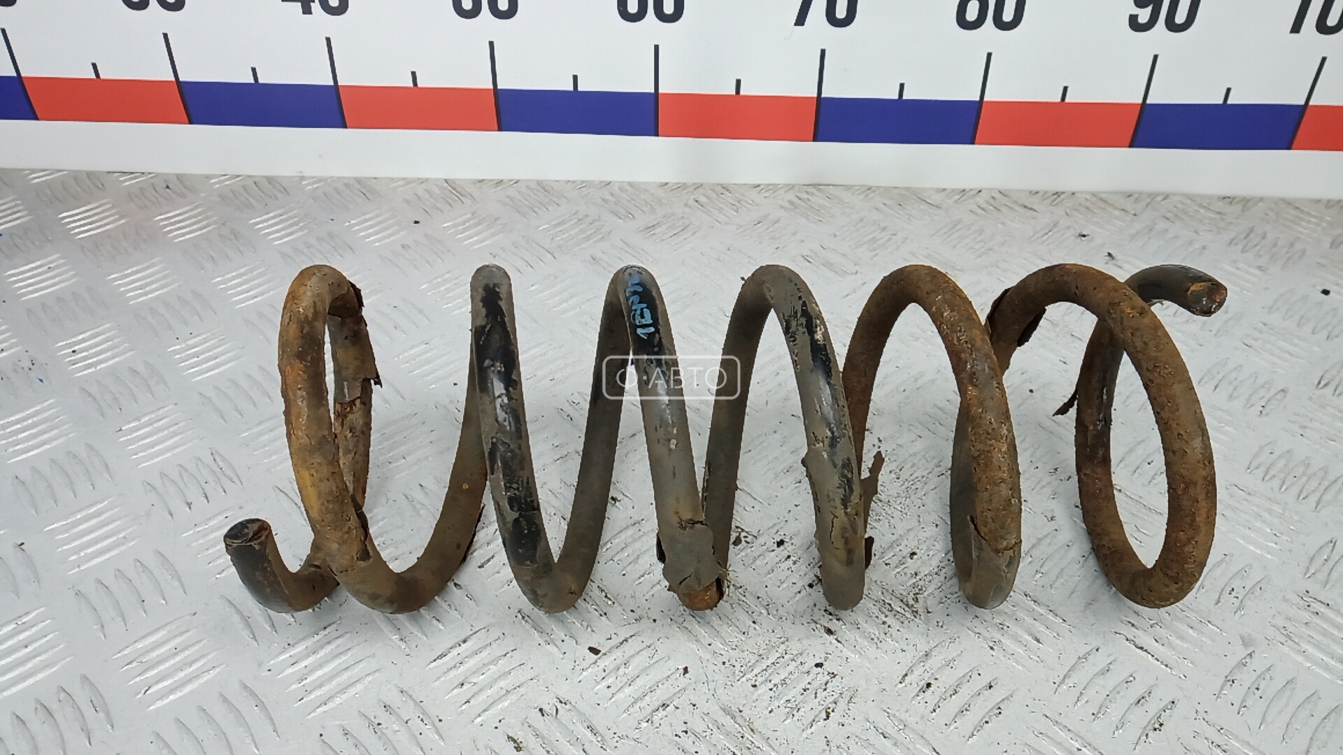 Пружина задняя