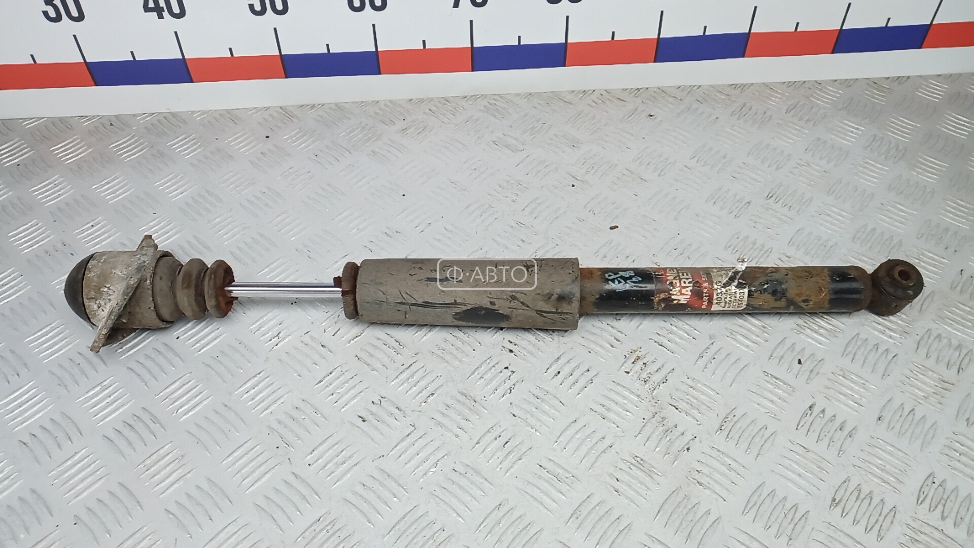 Амортизатор задней балки