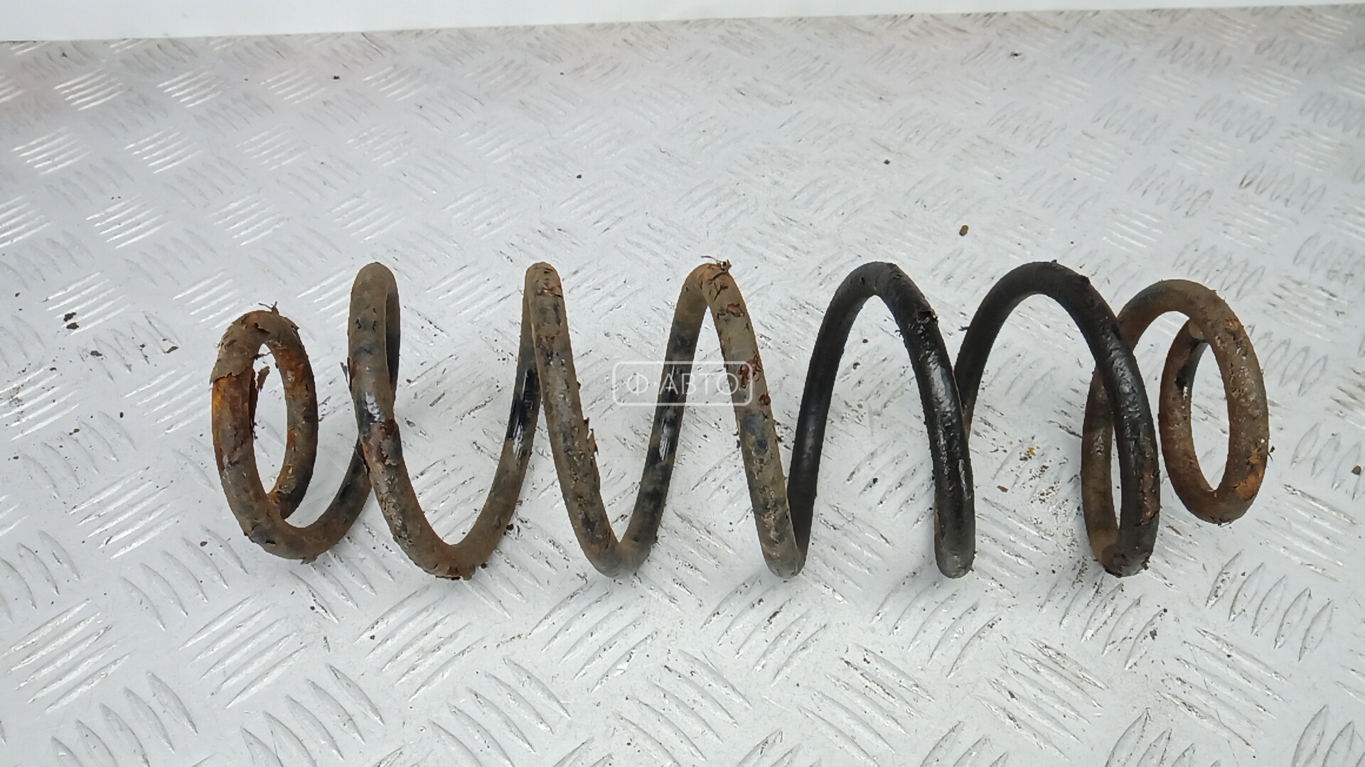 Пружина задняя