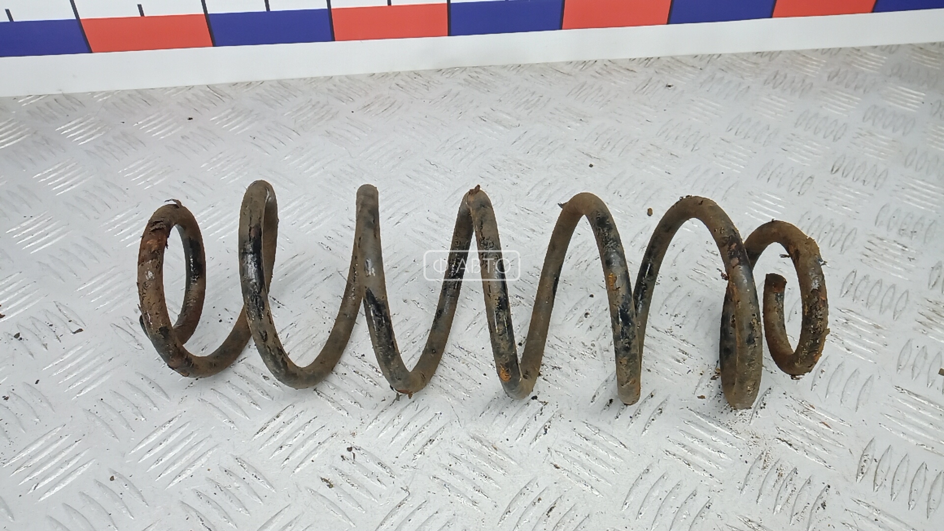 Пружина задняя