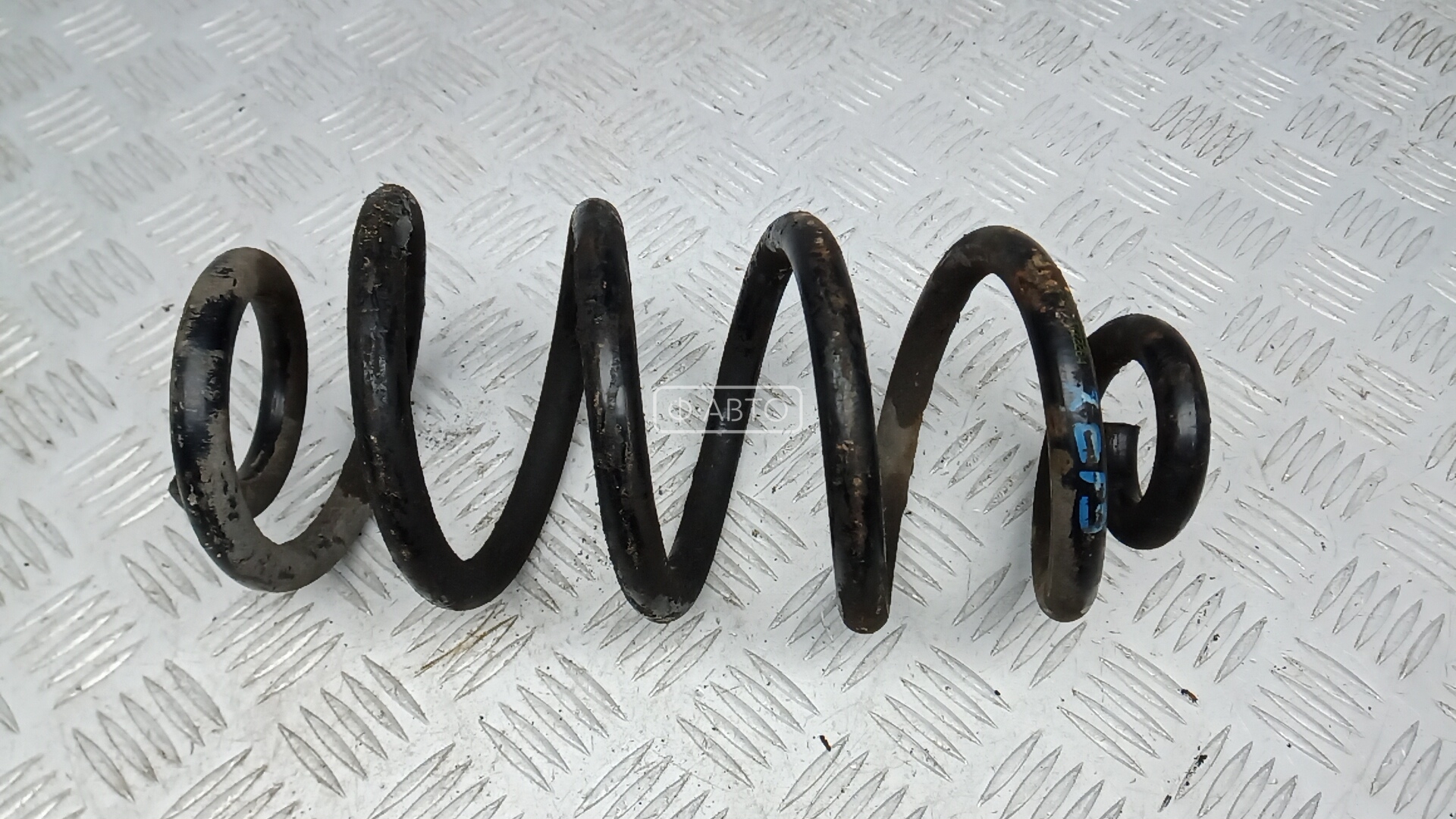 Пружина задняя