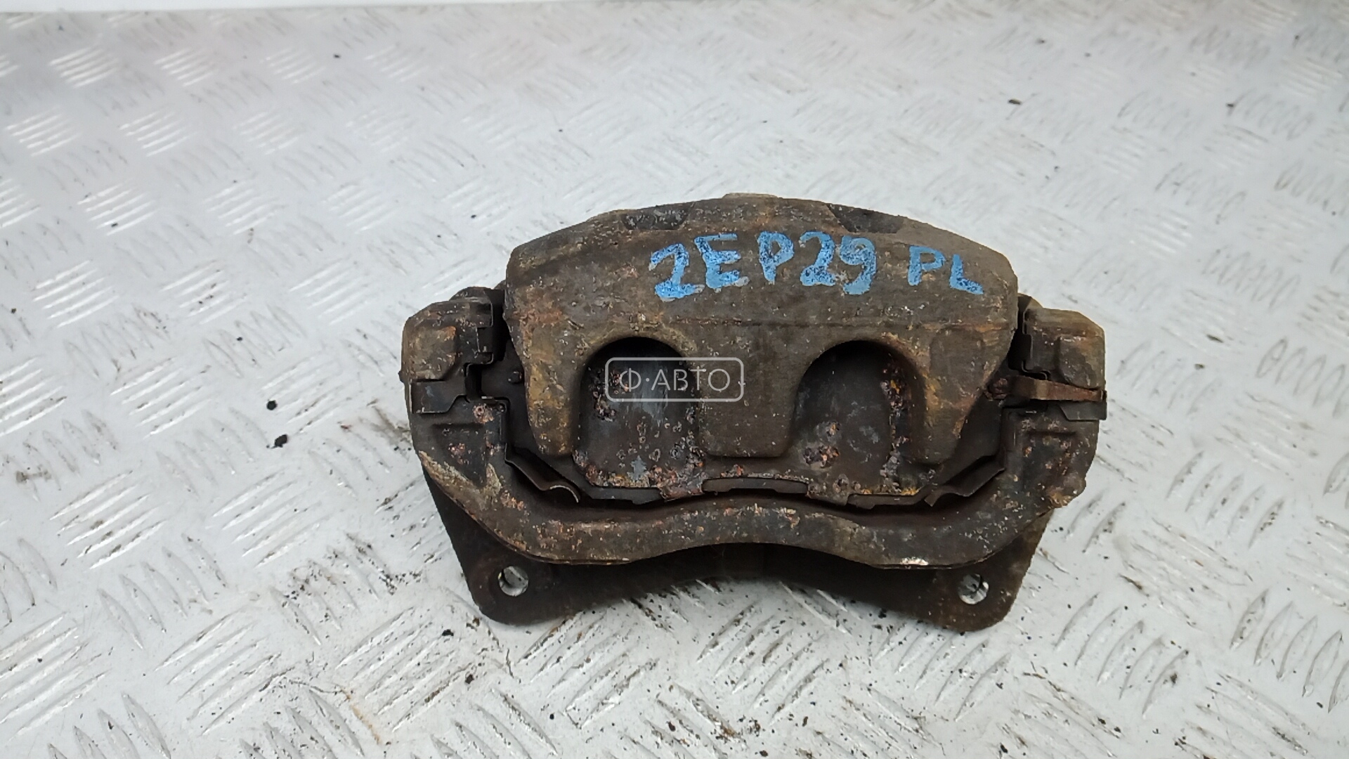 Суппорт тормозной передний левый