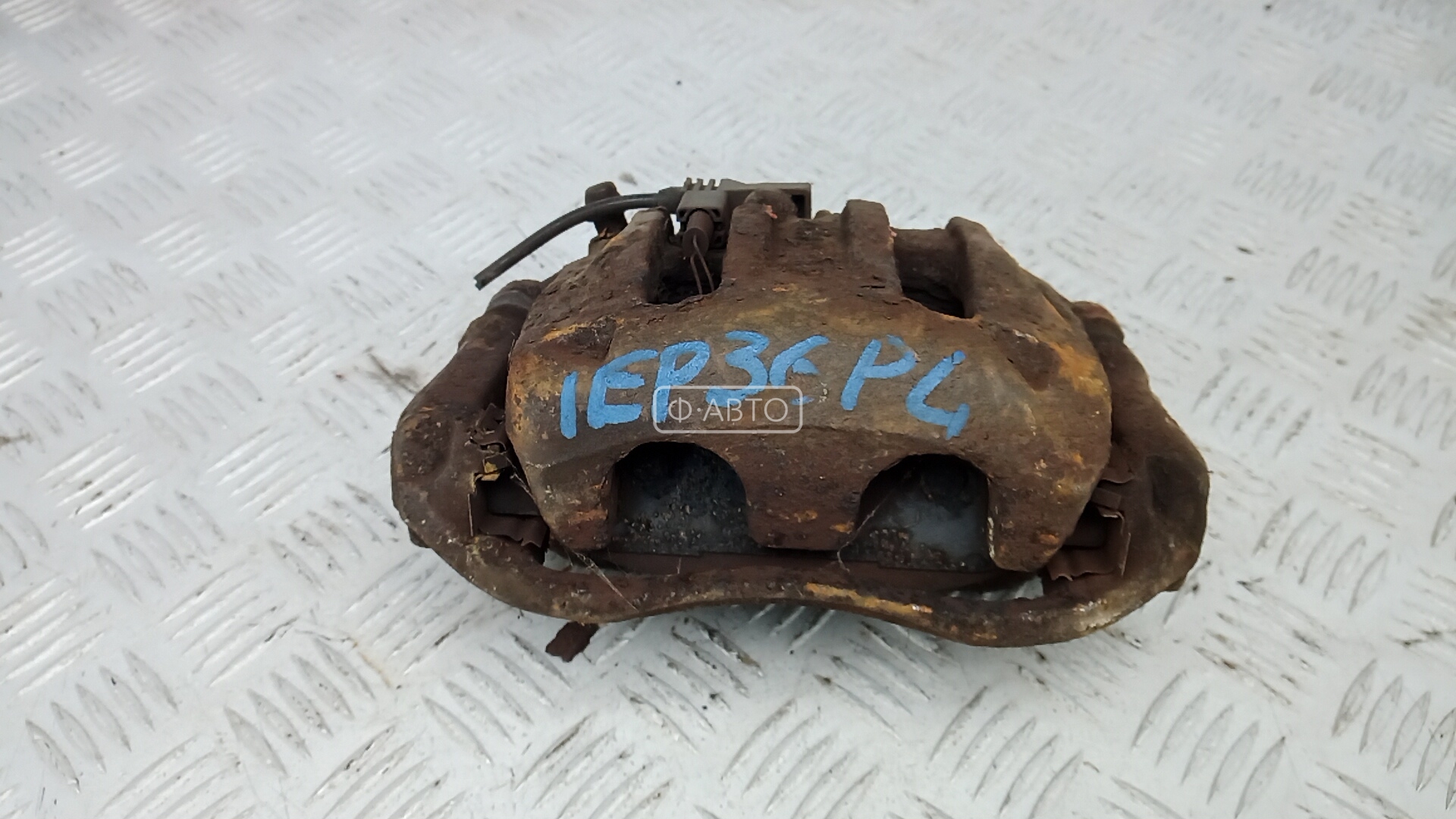 Суппорт тормозной передний левый