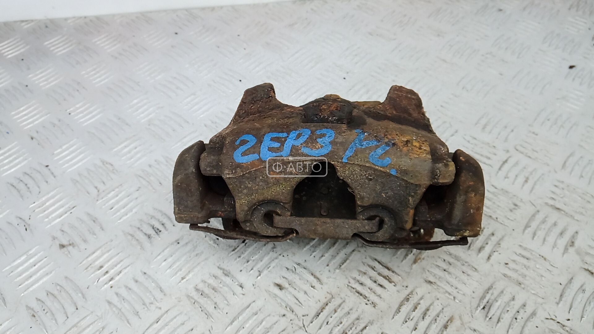 Суппорт тормозной передний левый