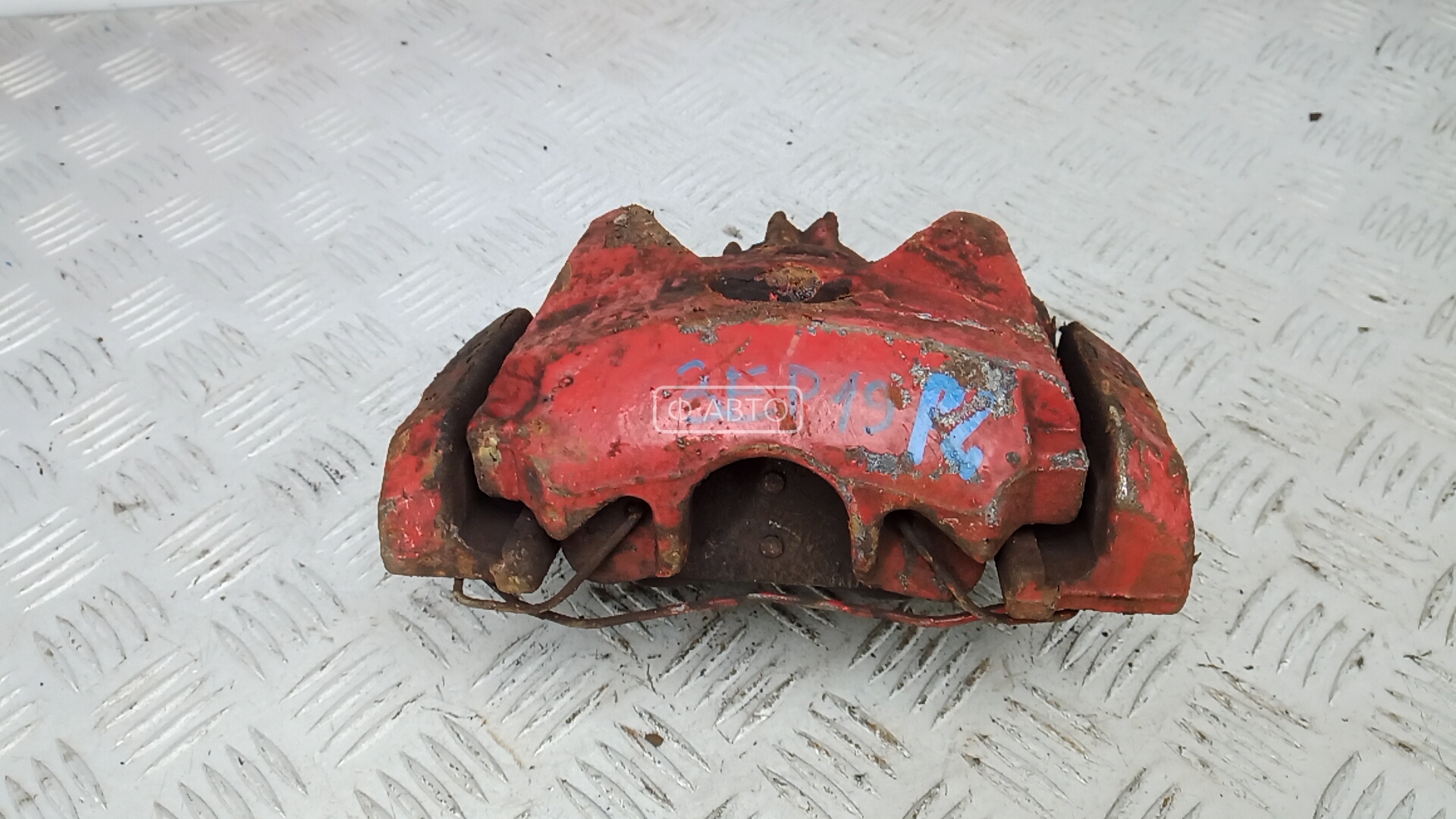 Суппорт тормозной передний левый