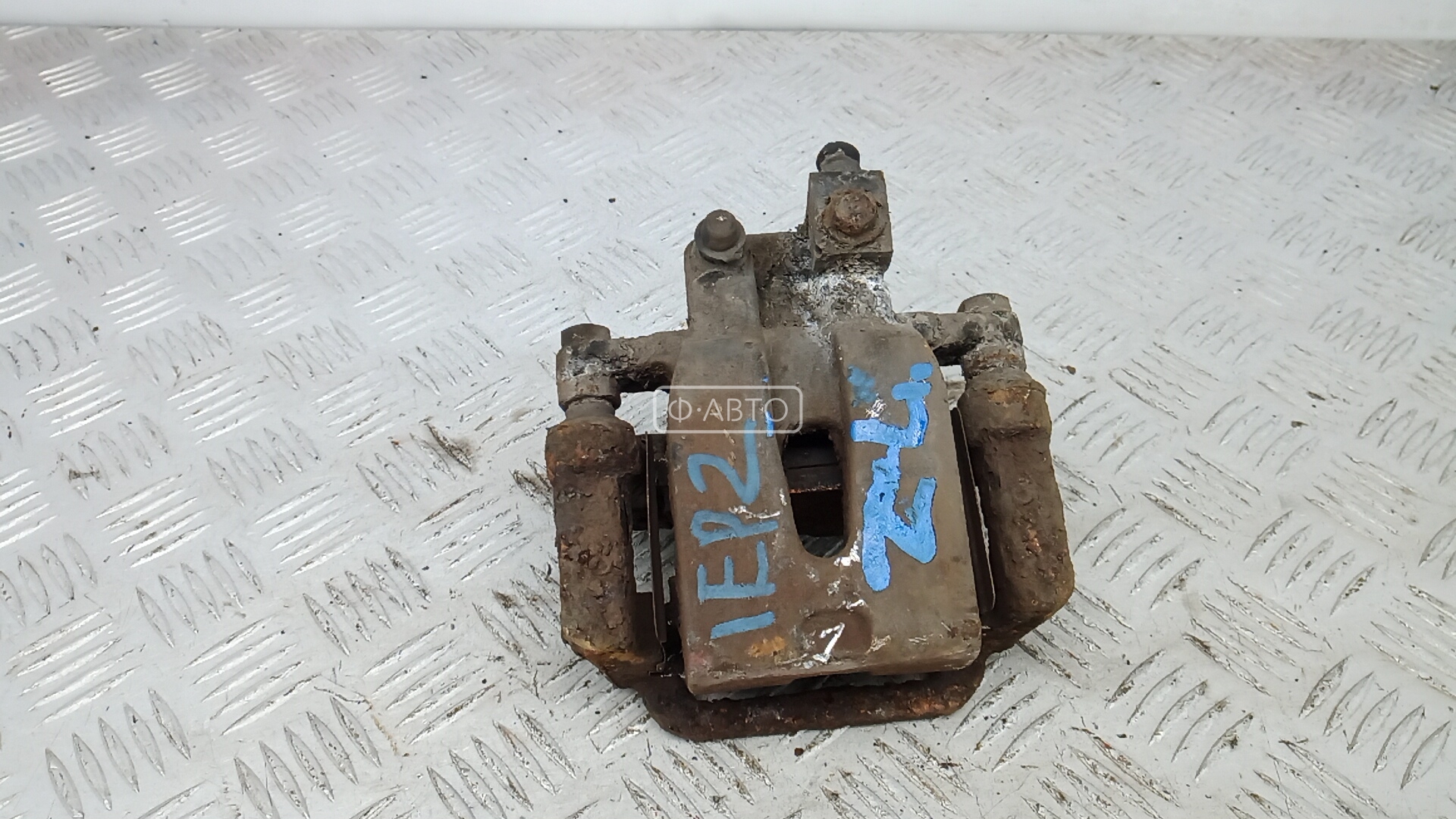 Суппорт тормозной задний левый
