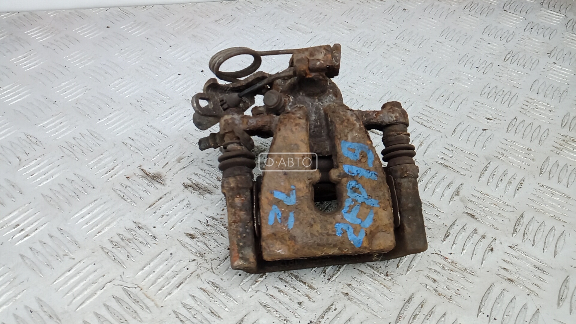 Суппорт тормозной задний левый