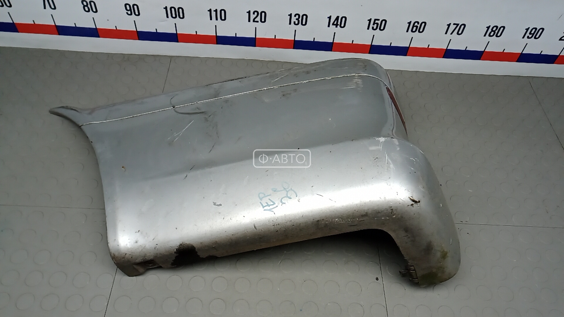 Клык бампера задний левый