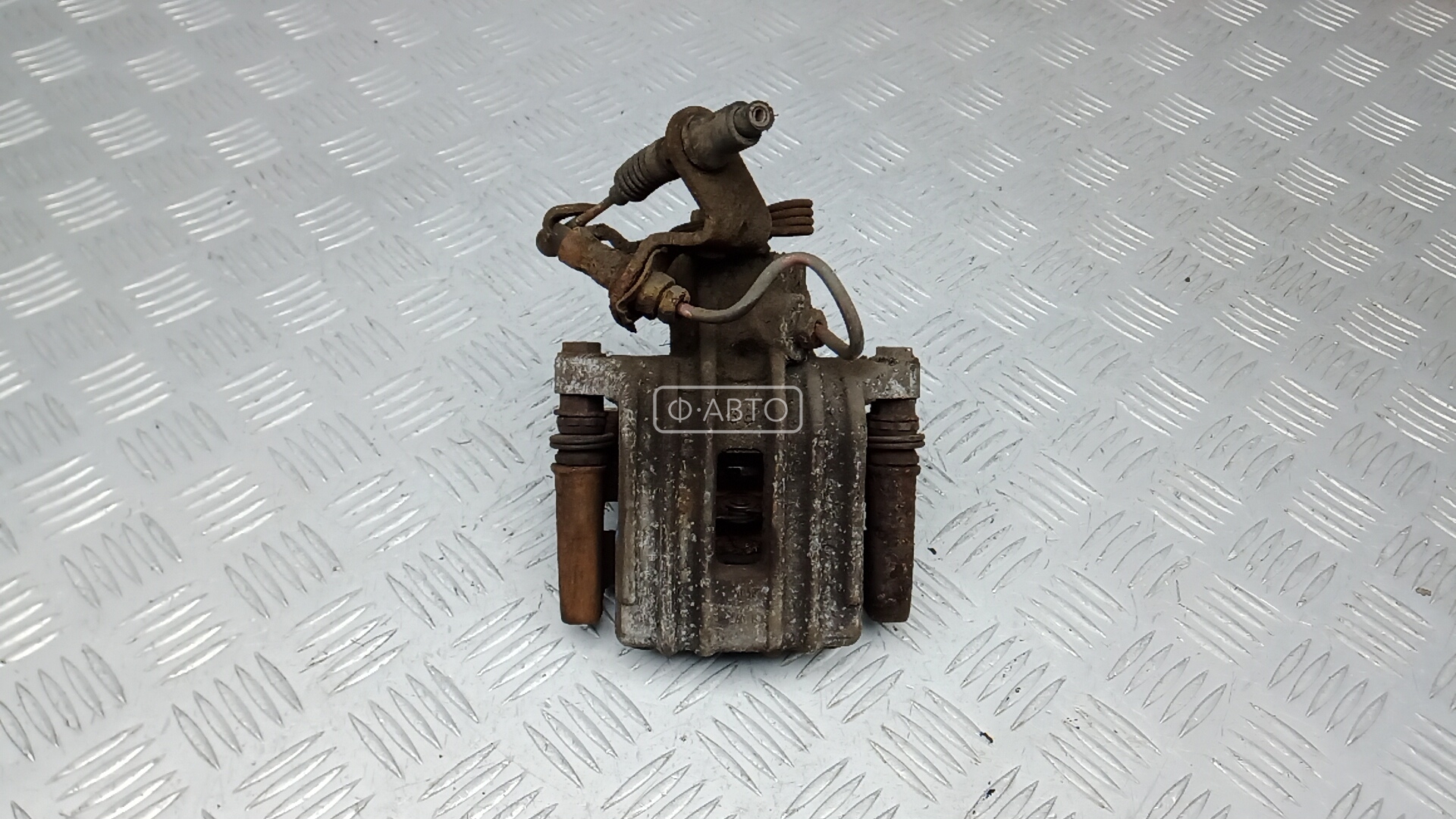 Суппорт тормозной задний правый