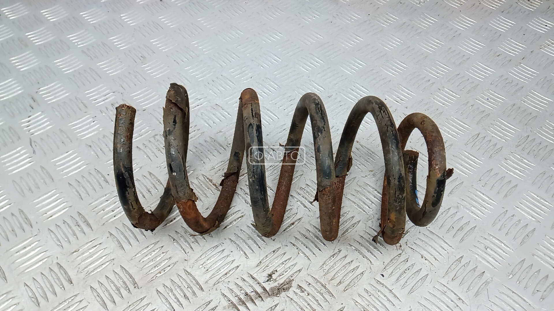 Пружина задняя