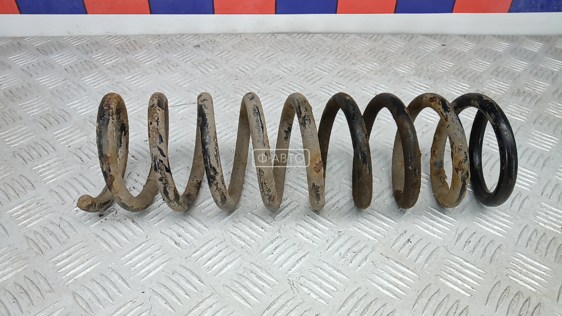 Пружина задняя