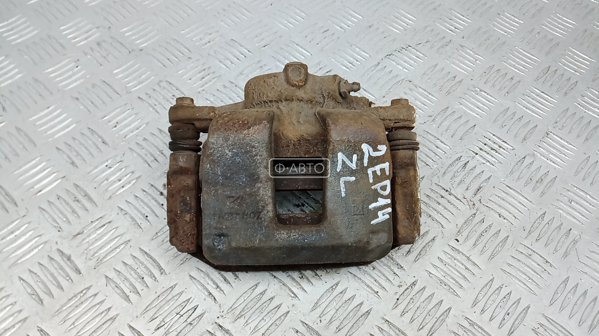 Суппорт тормозной задний левый