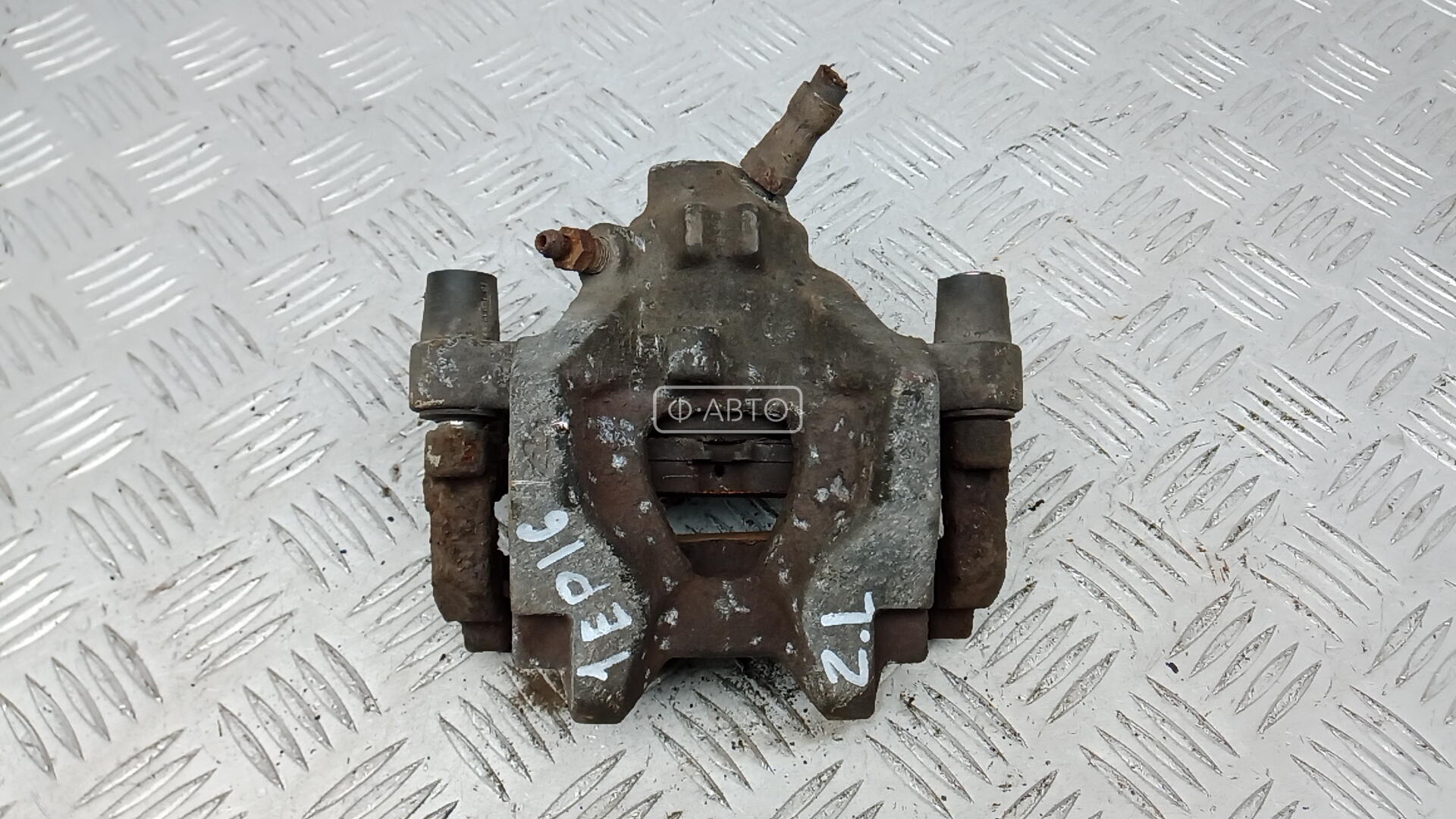 Суппорт тормозной задний левый