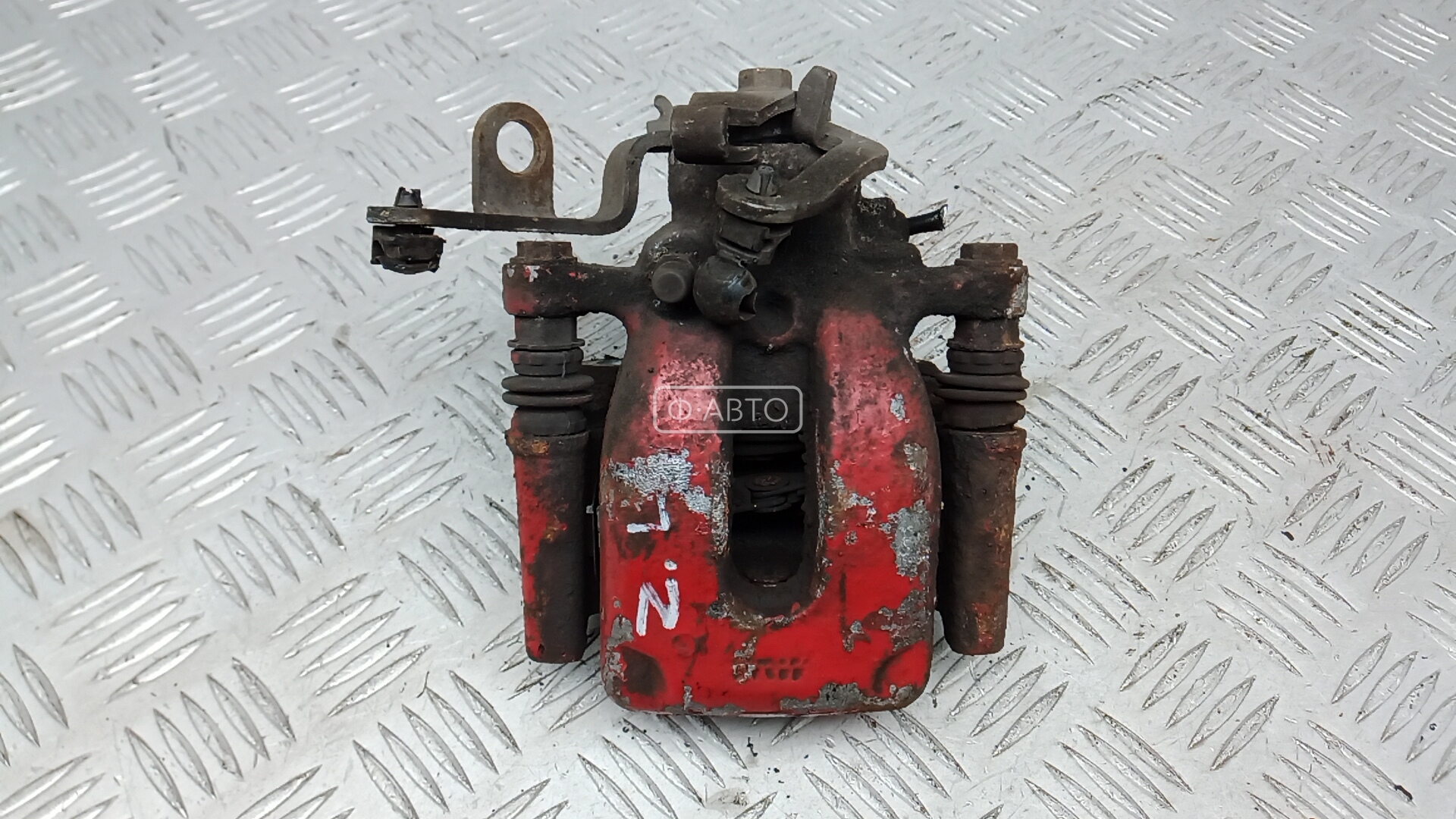 Суппорт тормозной задний левый