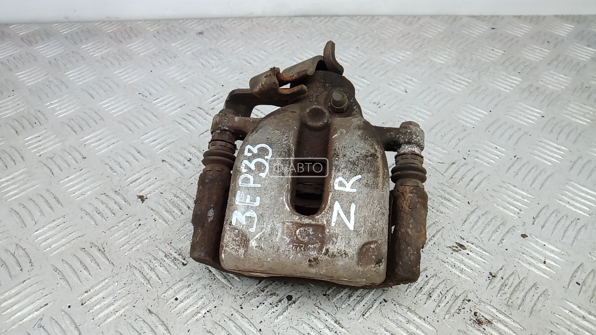 Суппорт тормозной задний правый