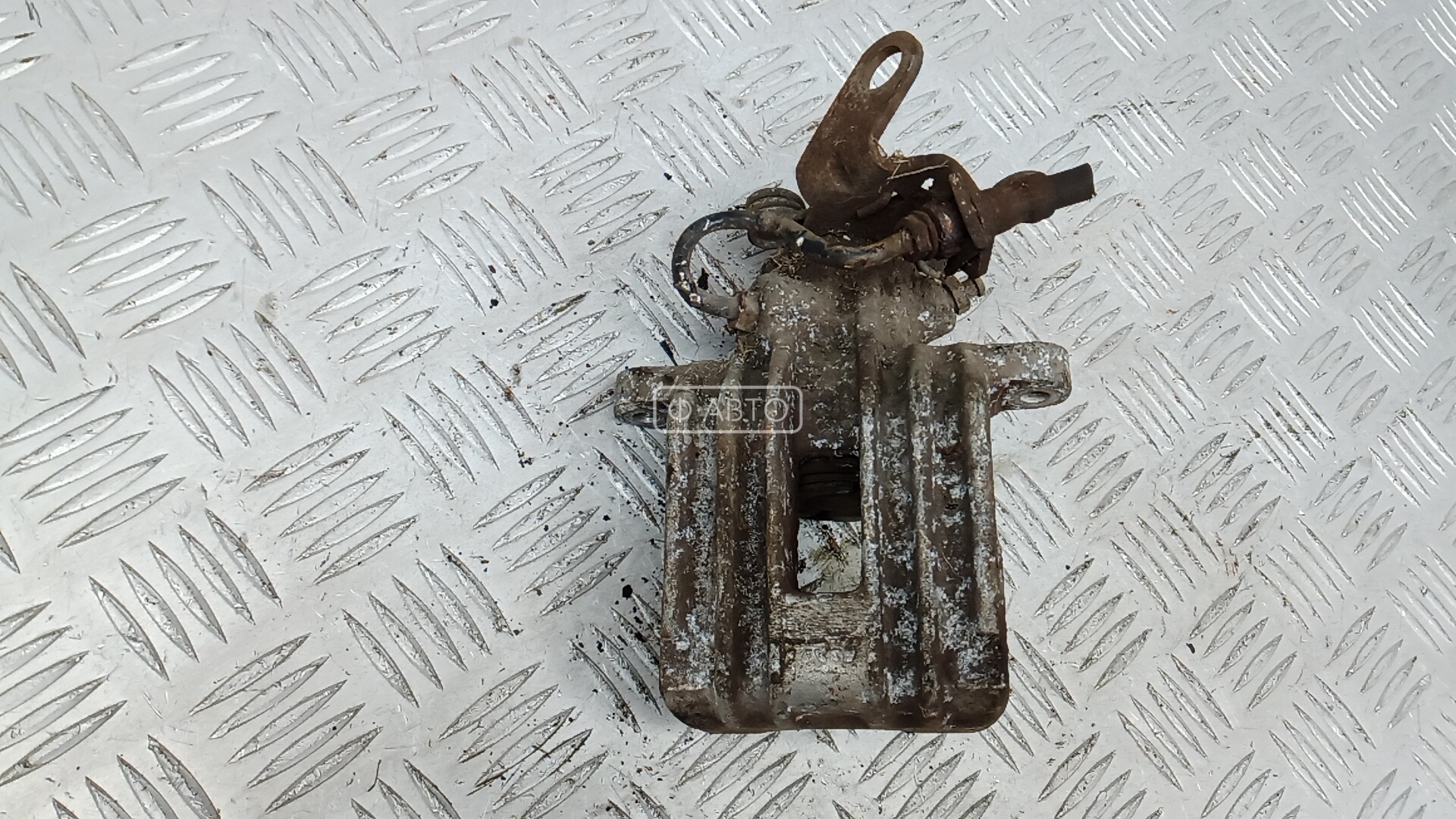 Суппорт тормозной задний левый