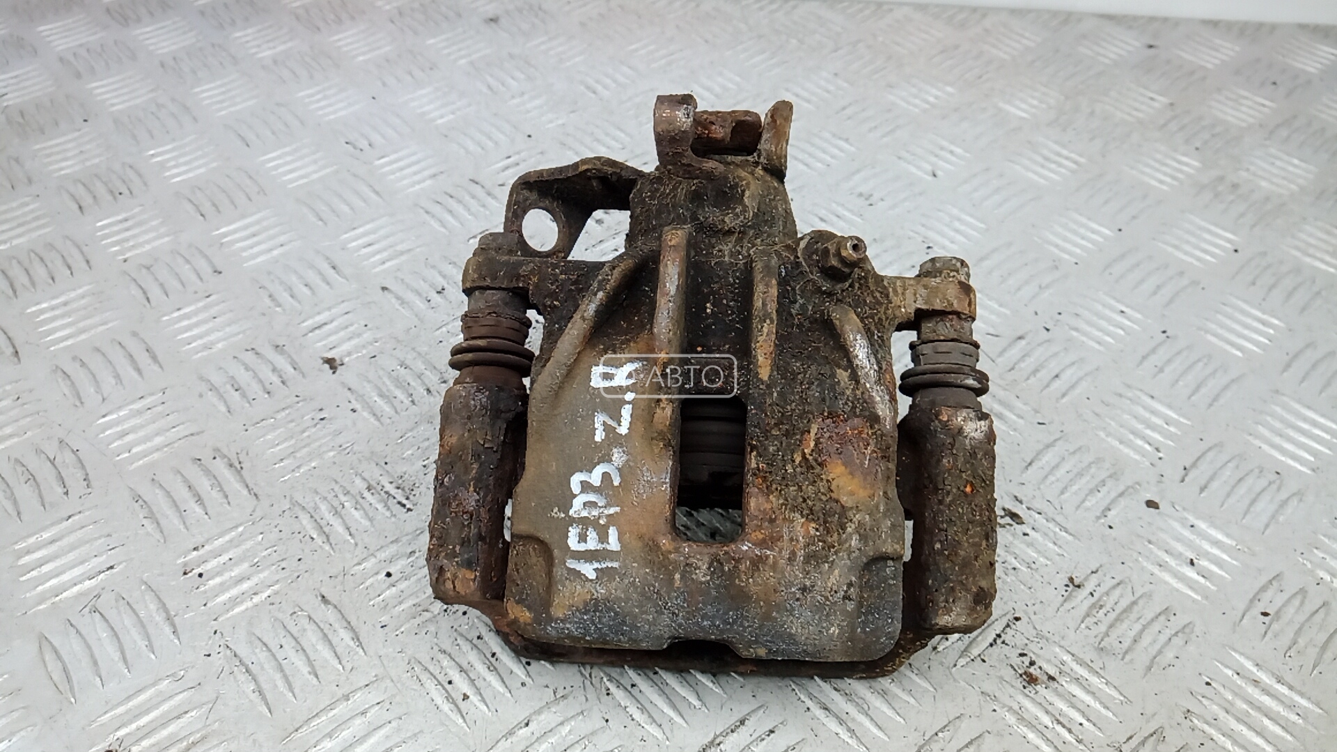 Суппорт тормозной задний правый