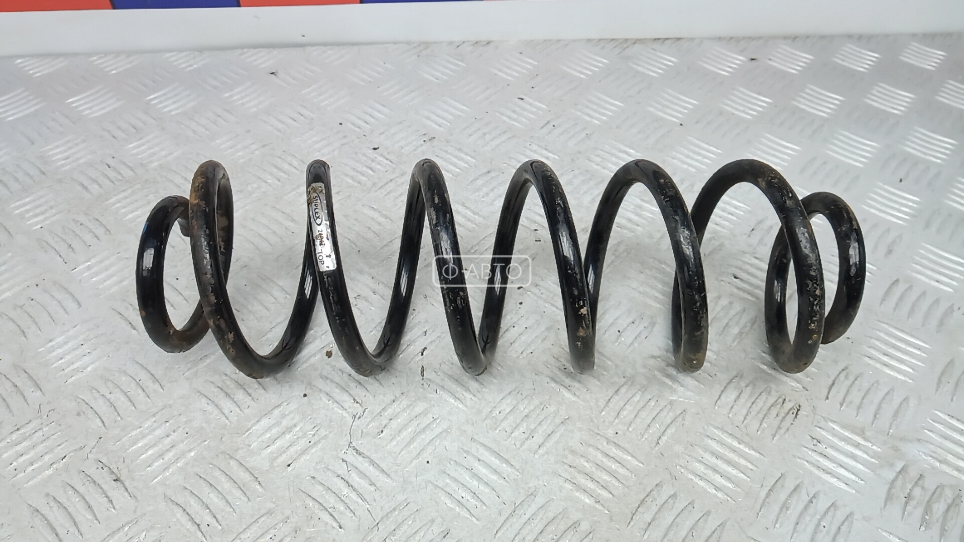 Пружина задняя