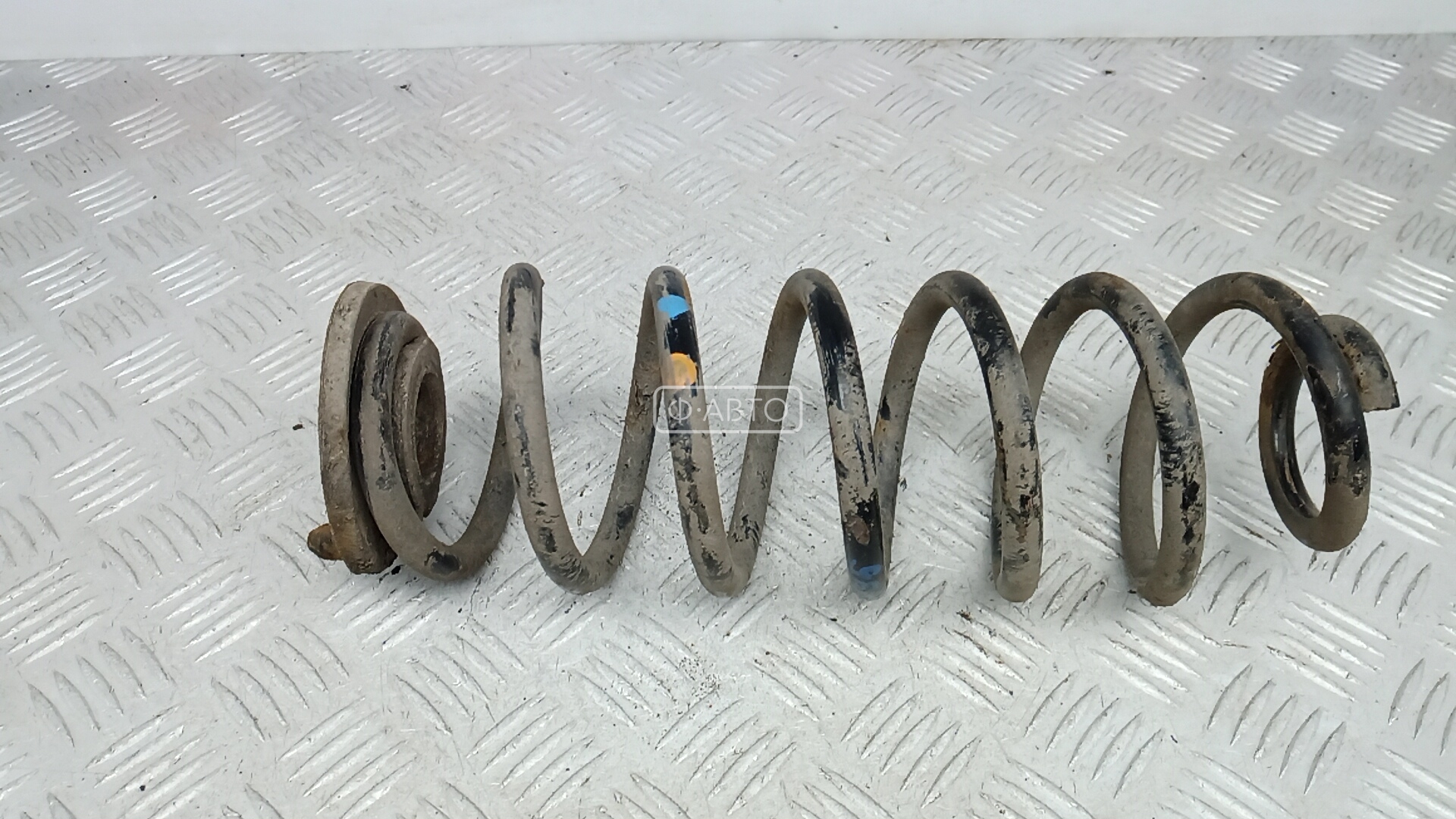 Пружина задняя