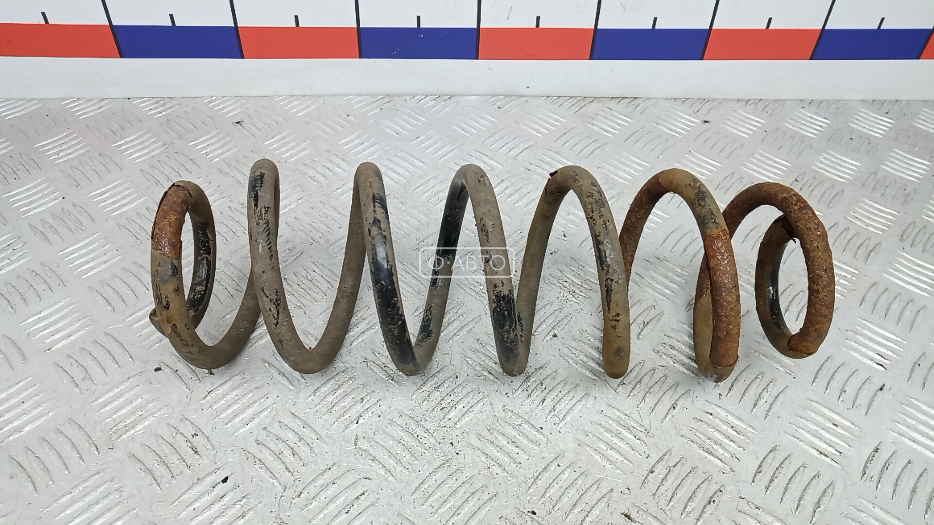 Пружина задняя