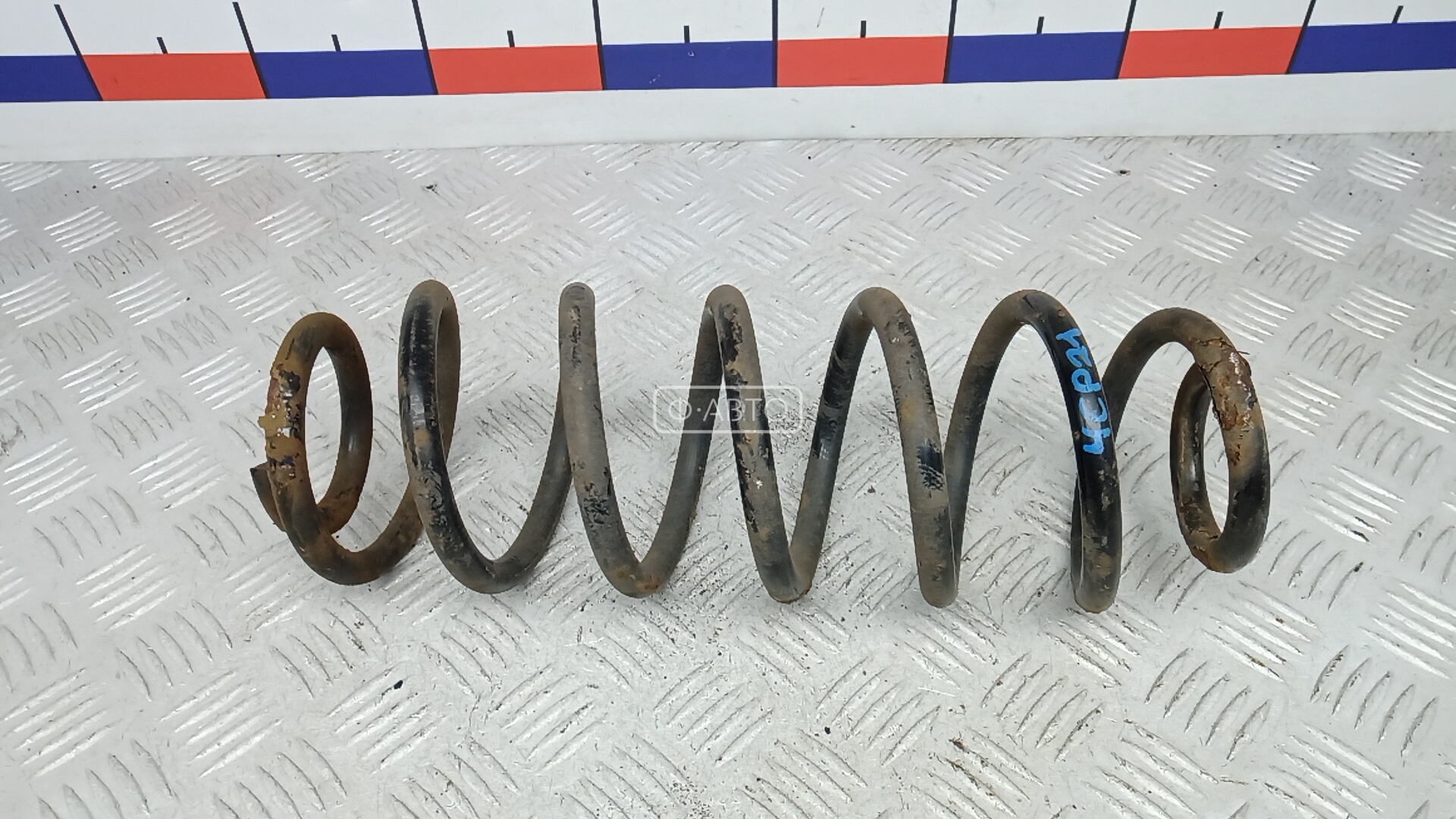 Пружина задняя