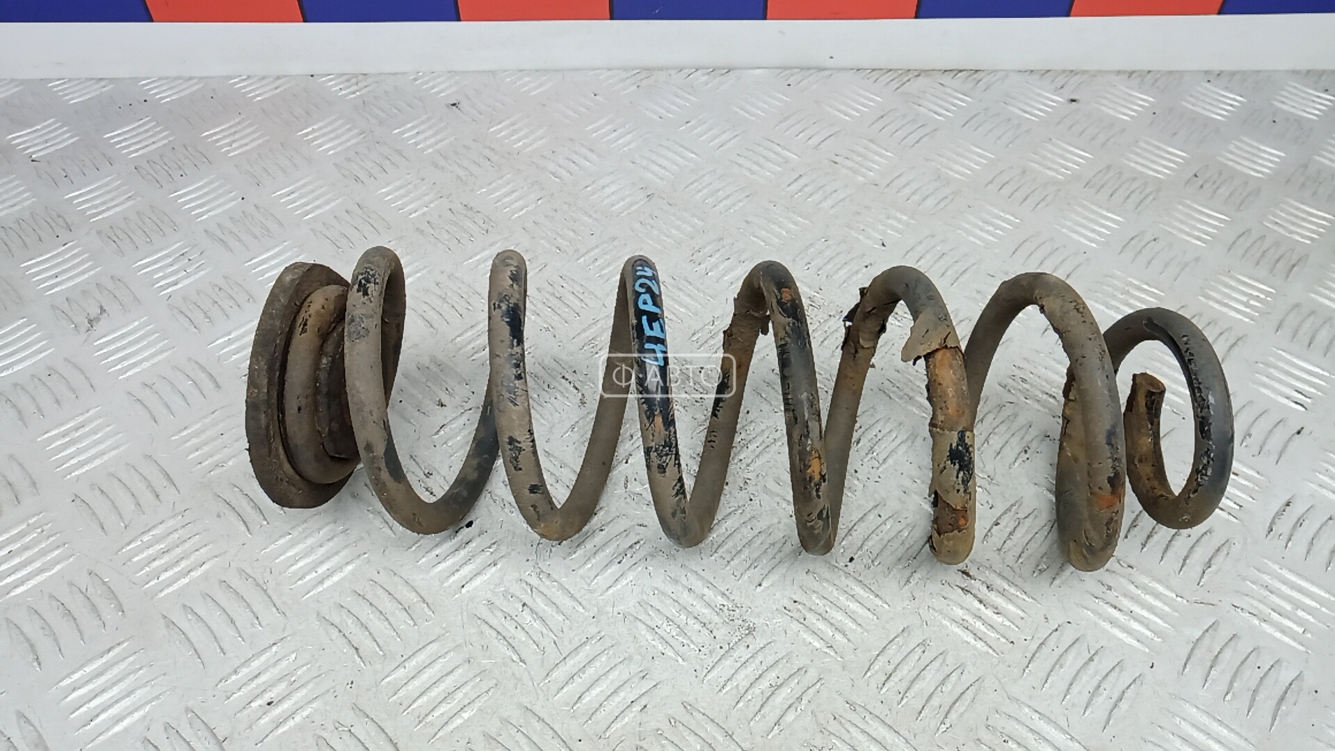 Пружина задняя