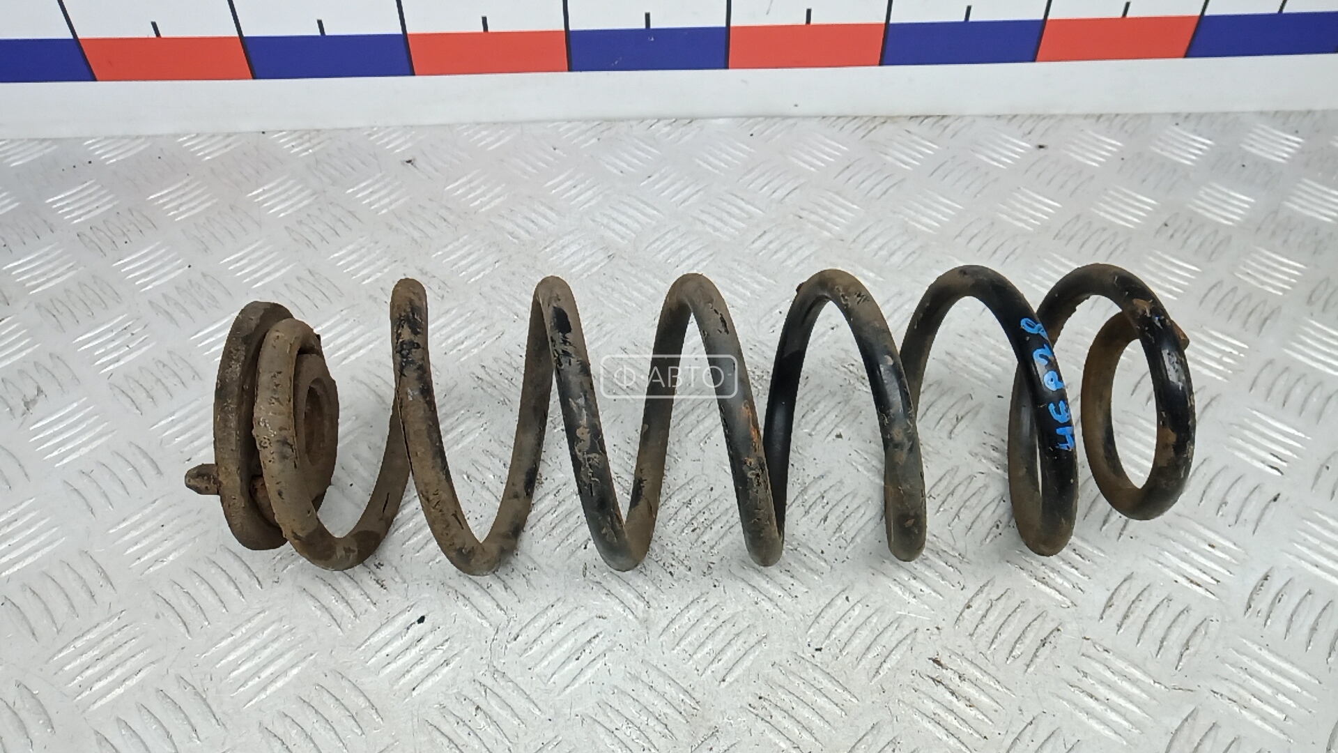 Пружина задняя