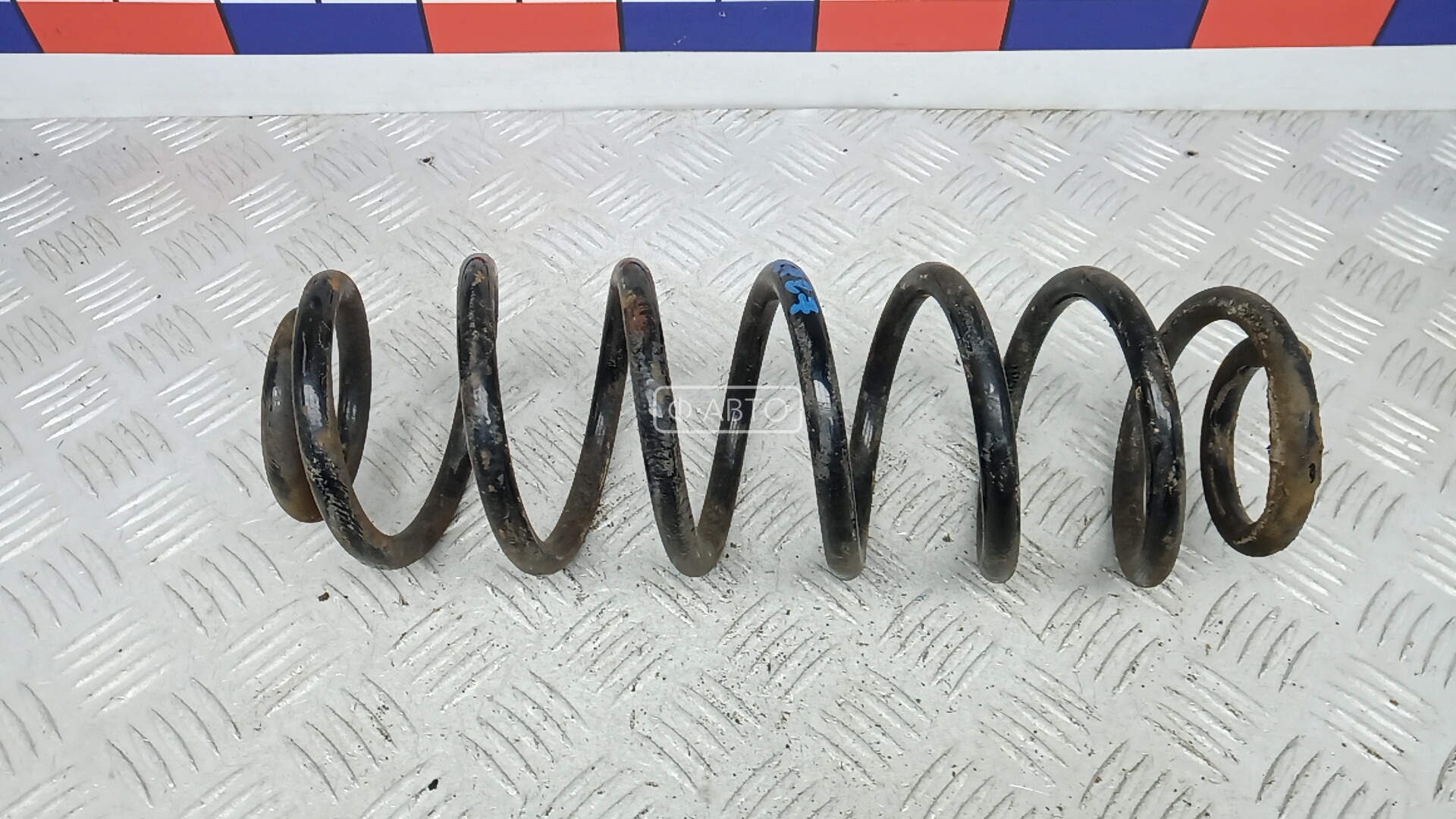 Пружина задняя