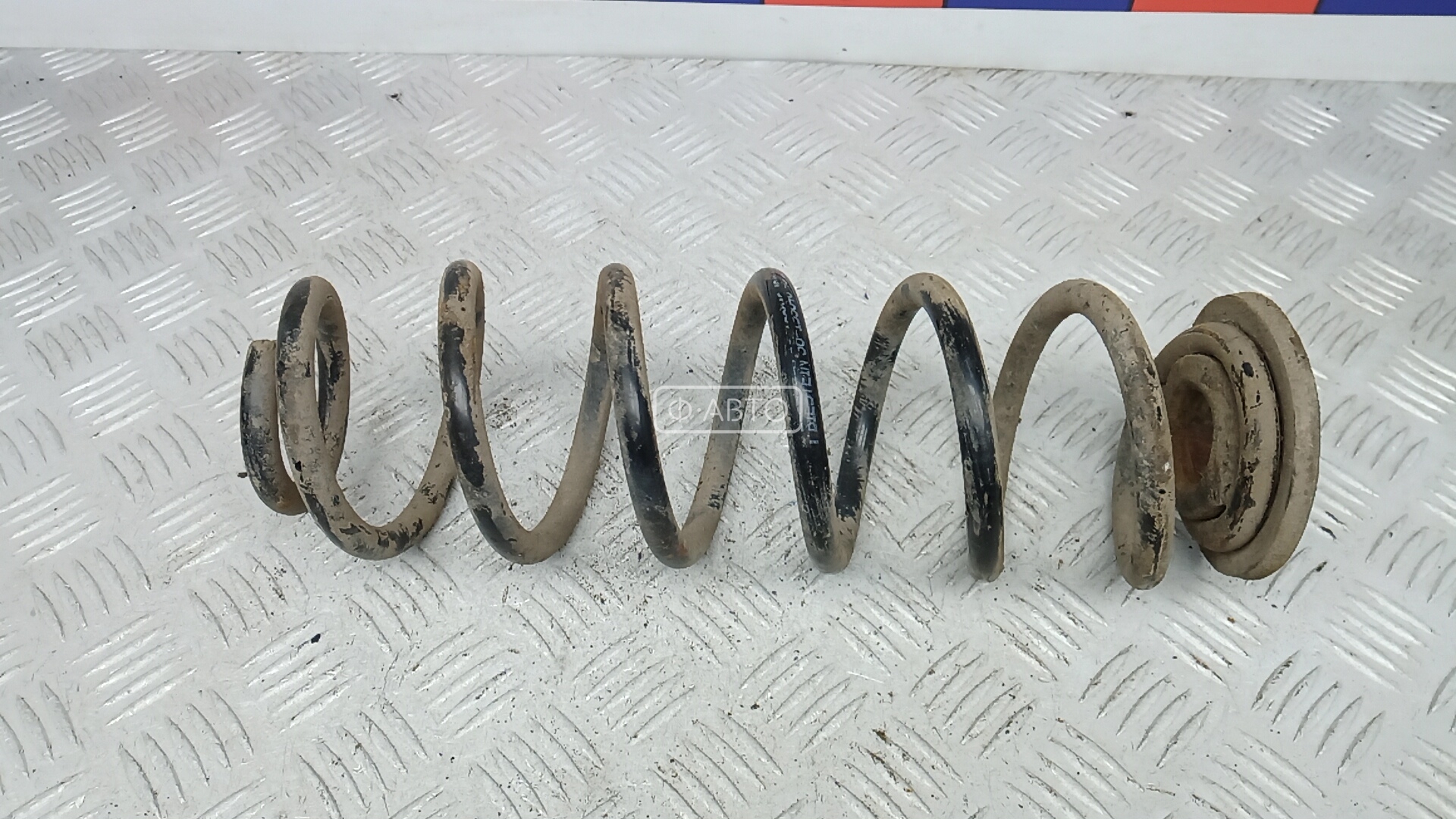 Пружина задняя