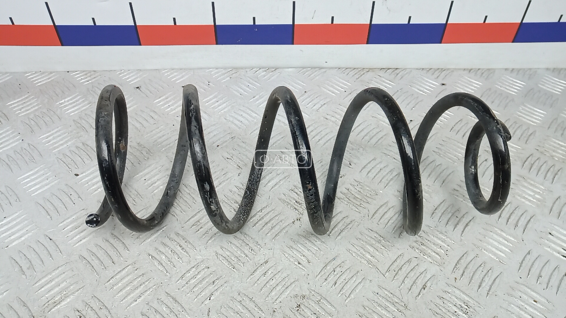 Пружина задняя