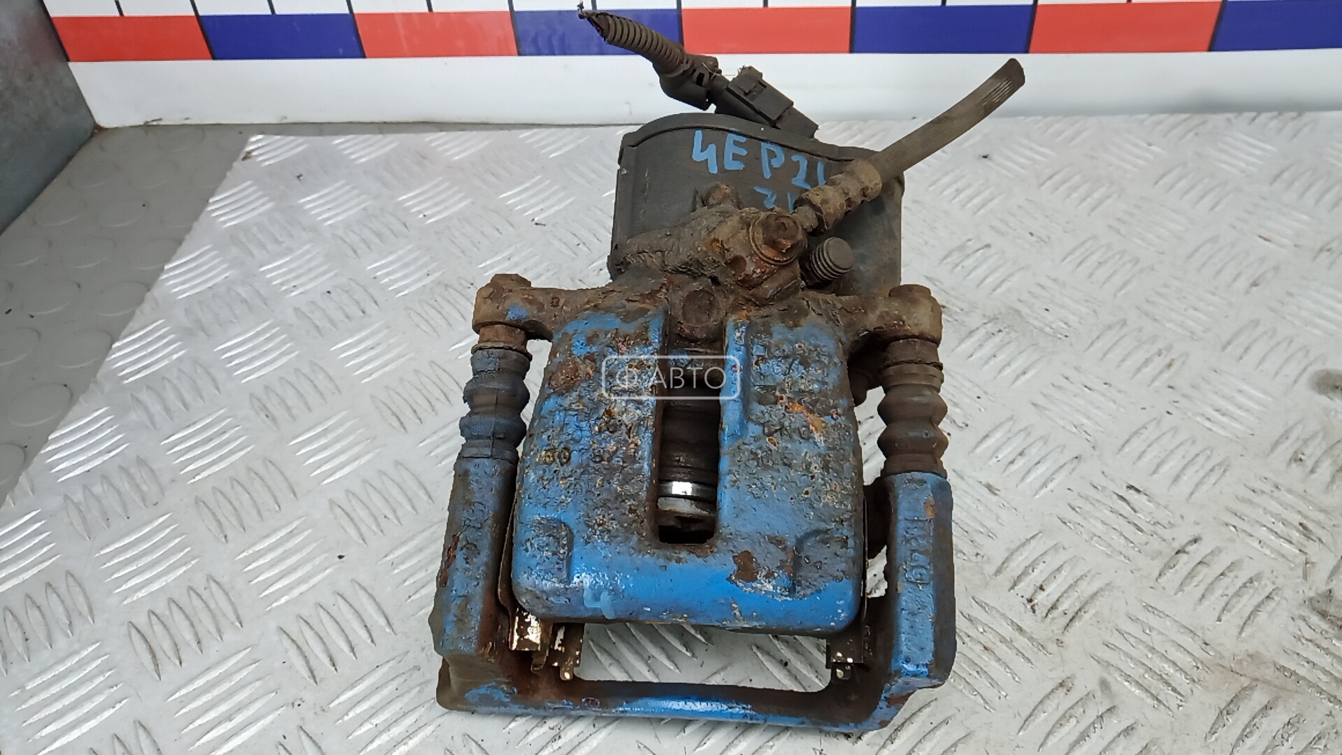 Суппорт тормозной задний левый