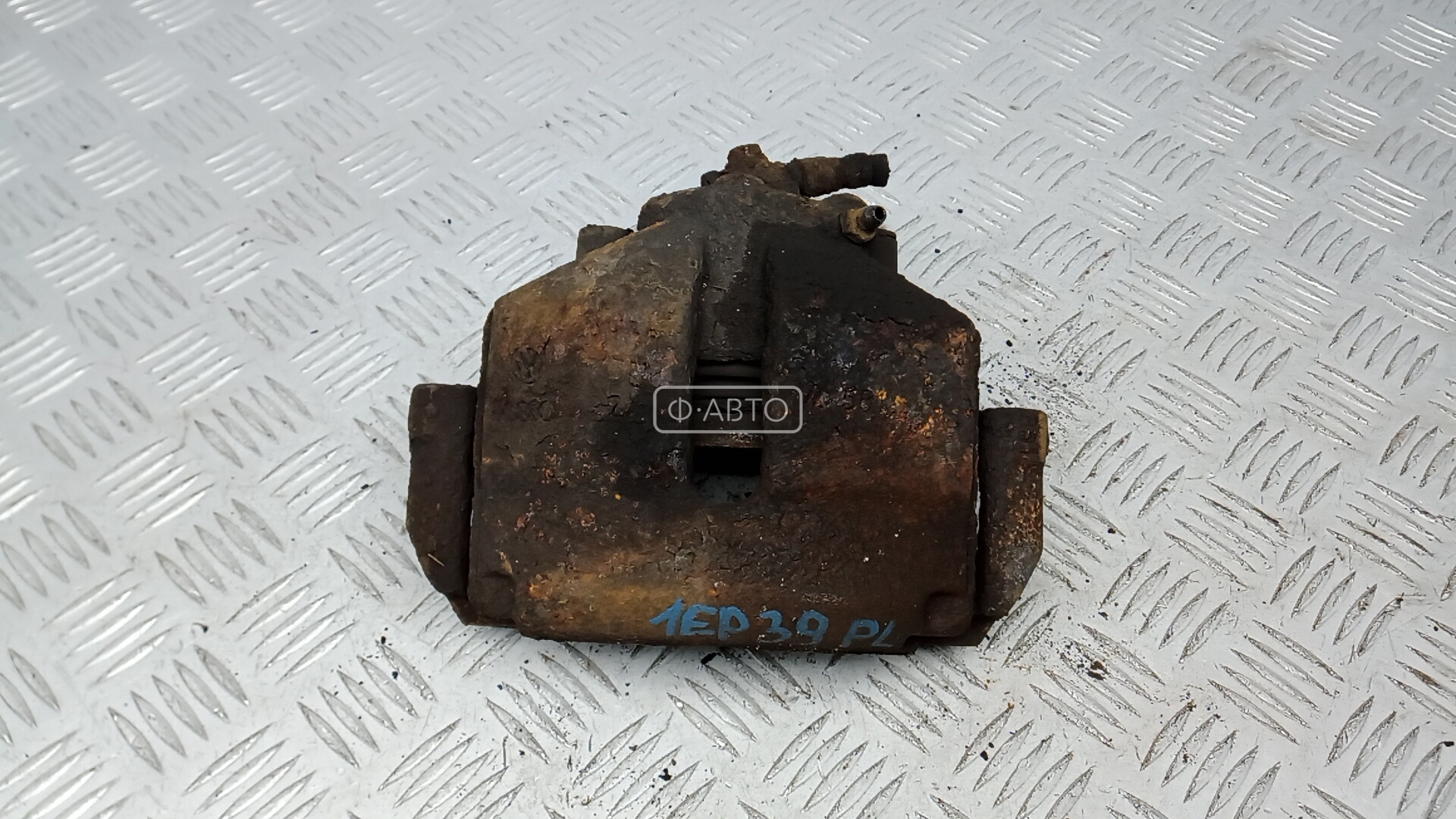 Суппорт тормозной передний левый