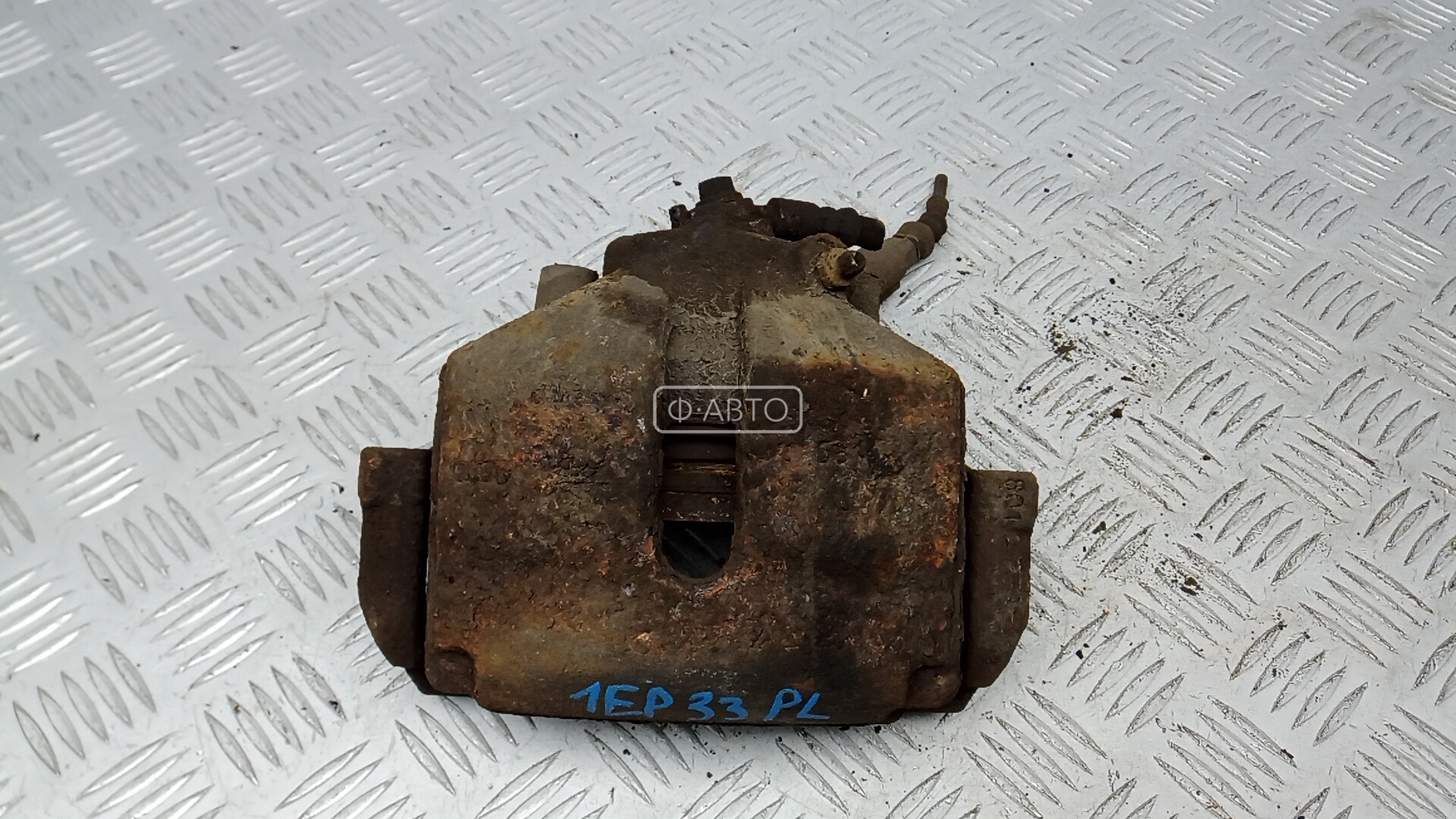 Суппорт тормозной передний левый