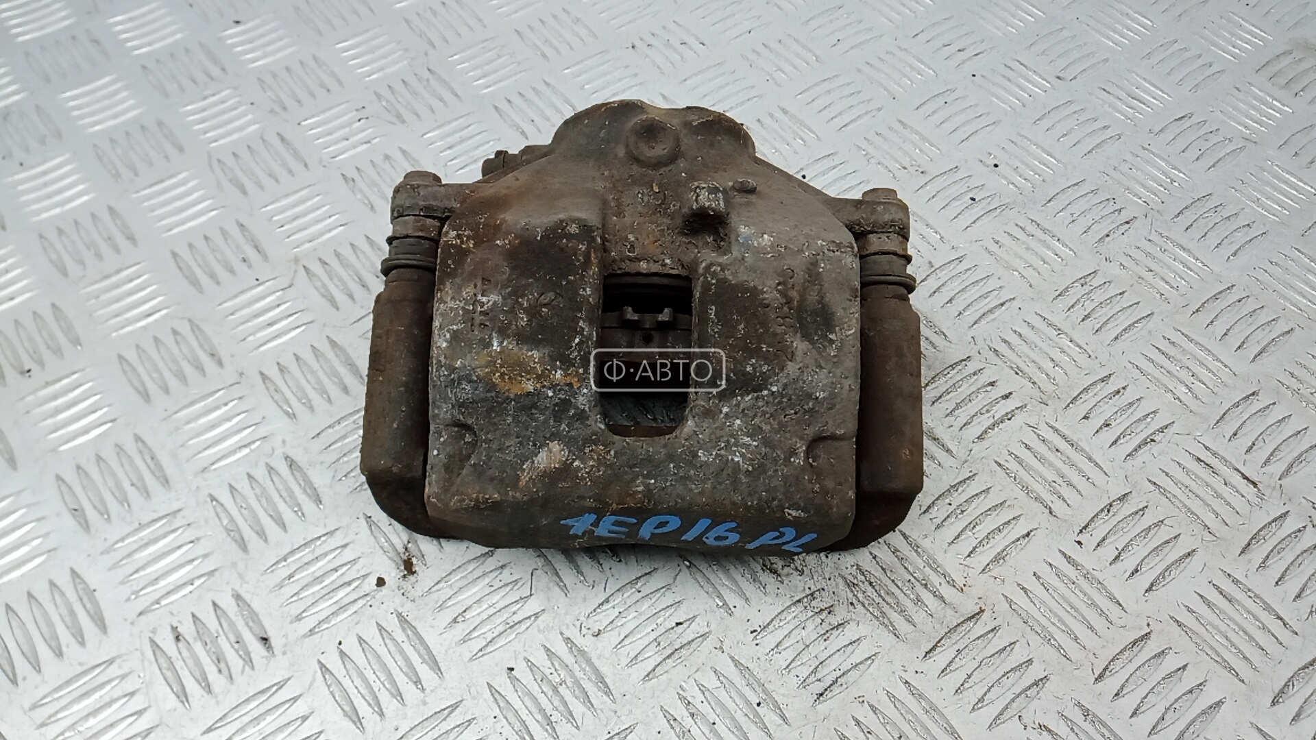 Суппорт тормозной передний левый