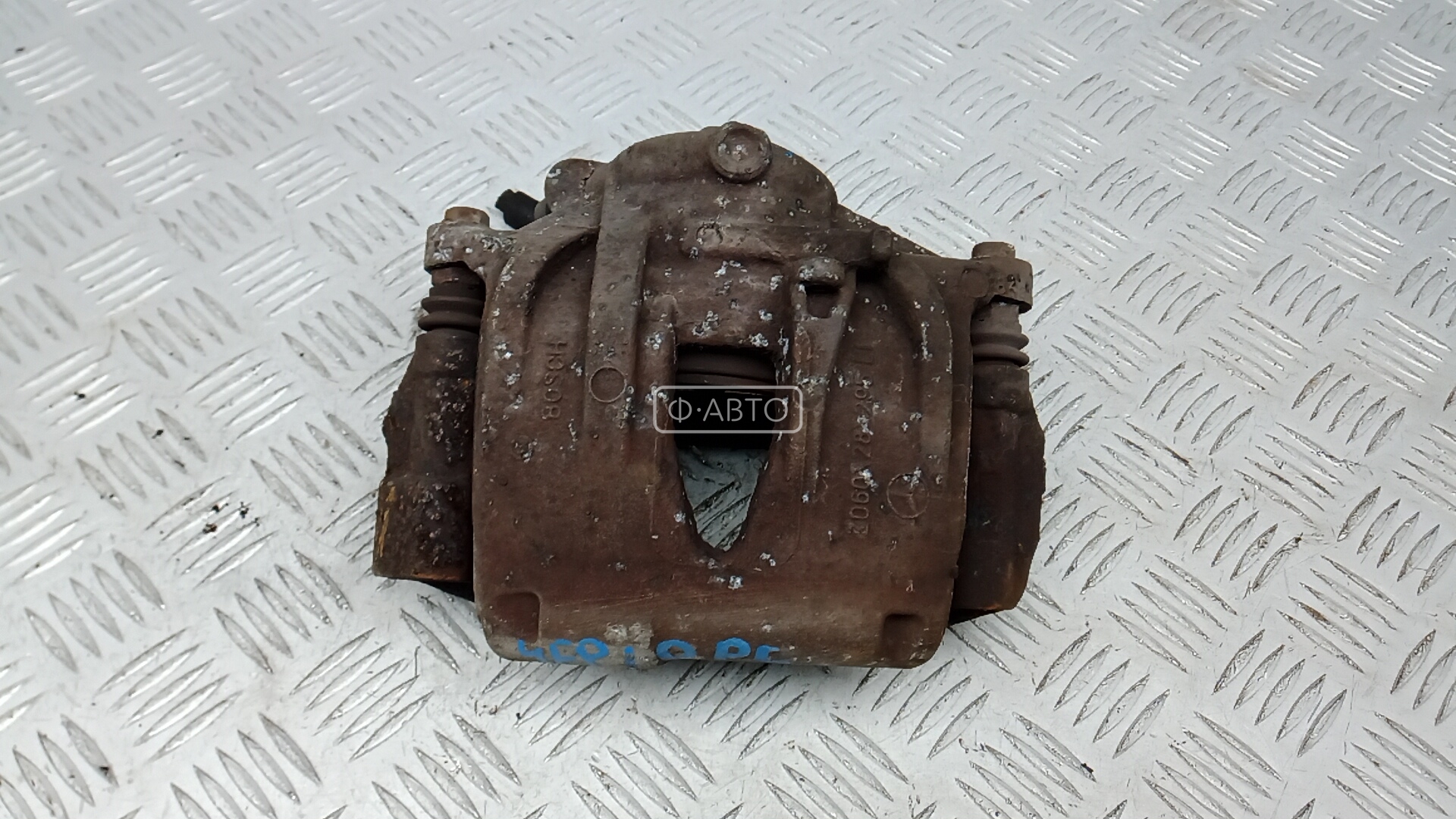 Суппорт тормозной передний левый