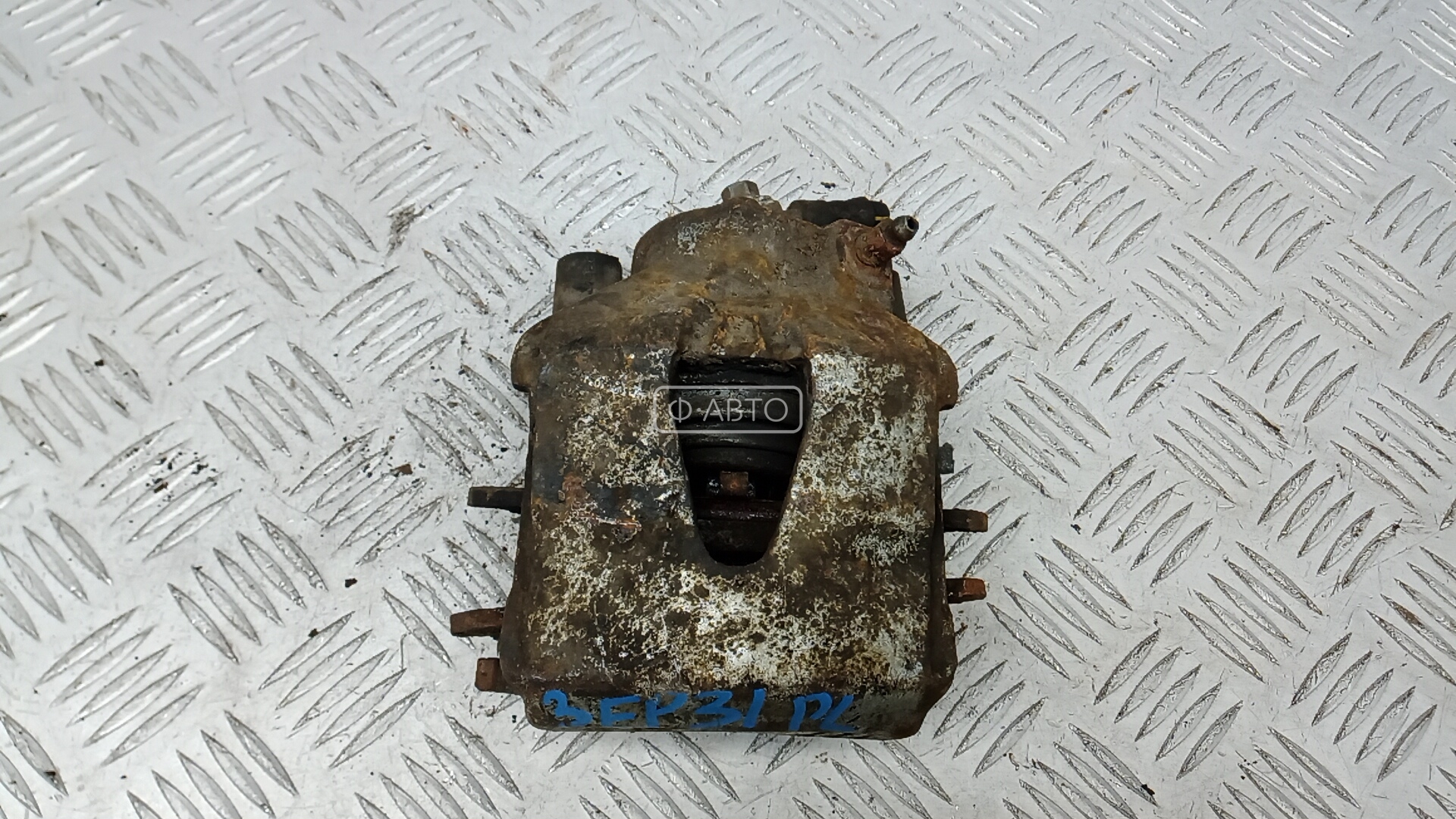 Суппорт тормозной передний левый