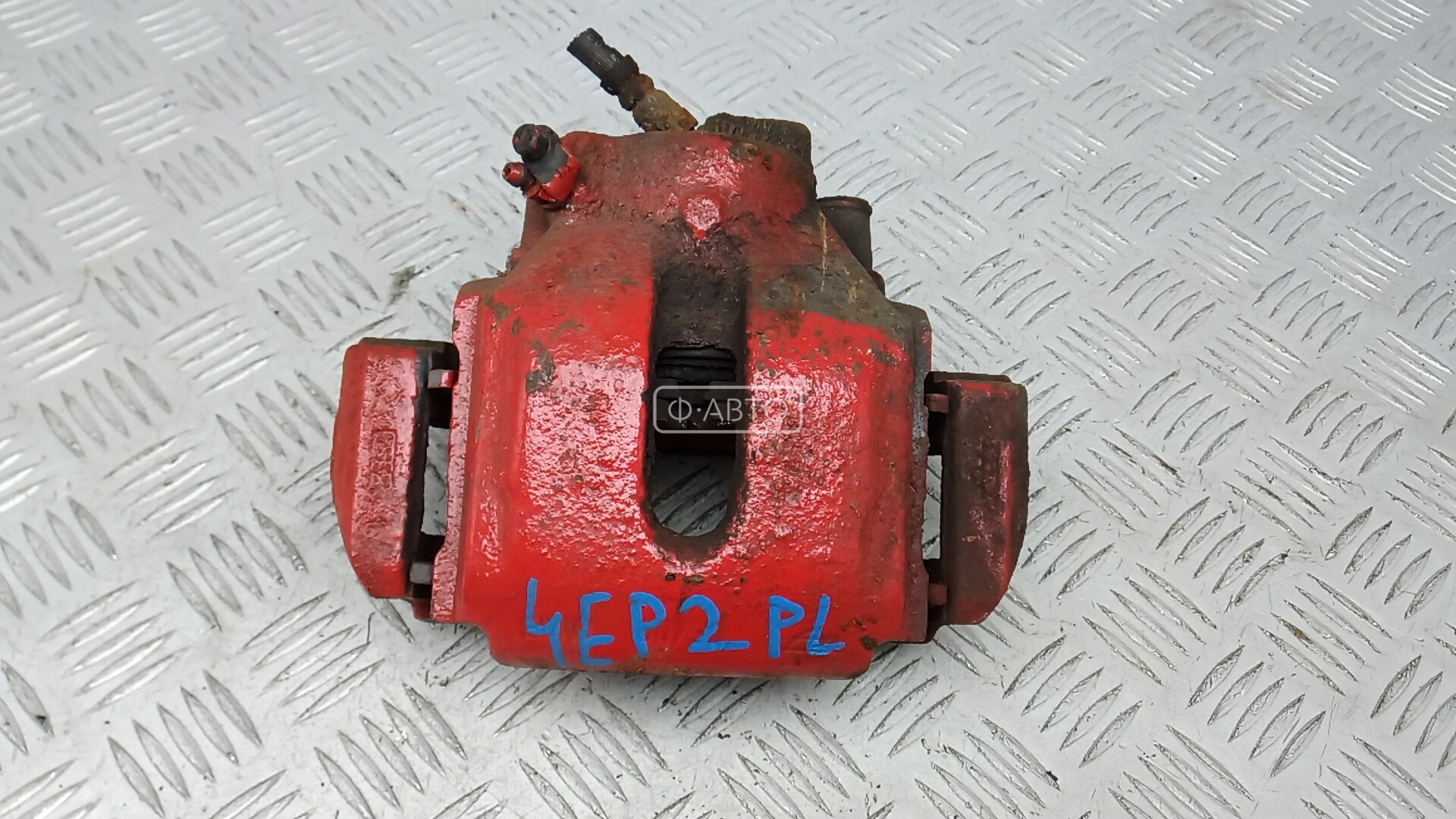 Суппорт тормозной передний левый